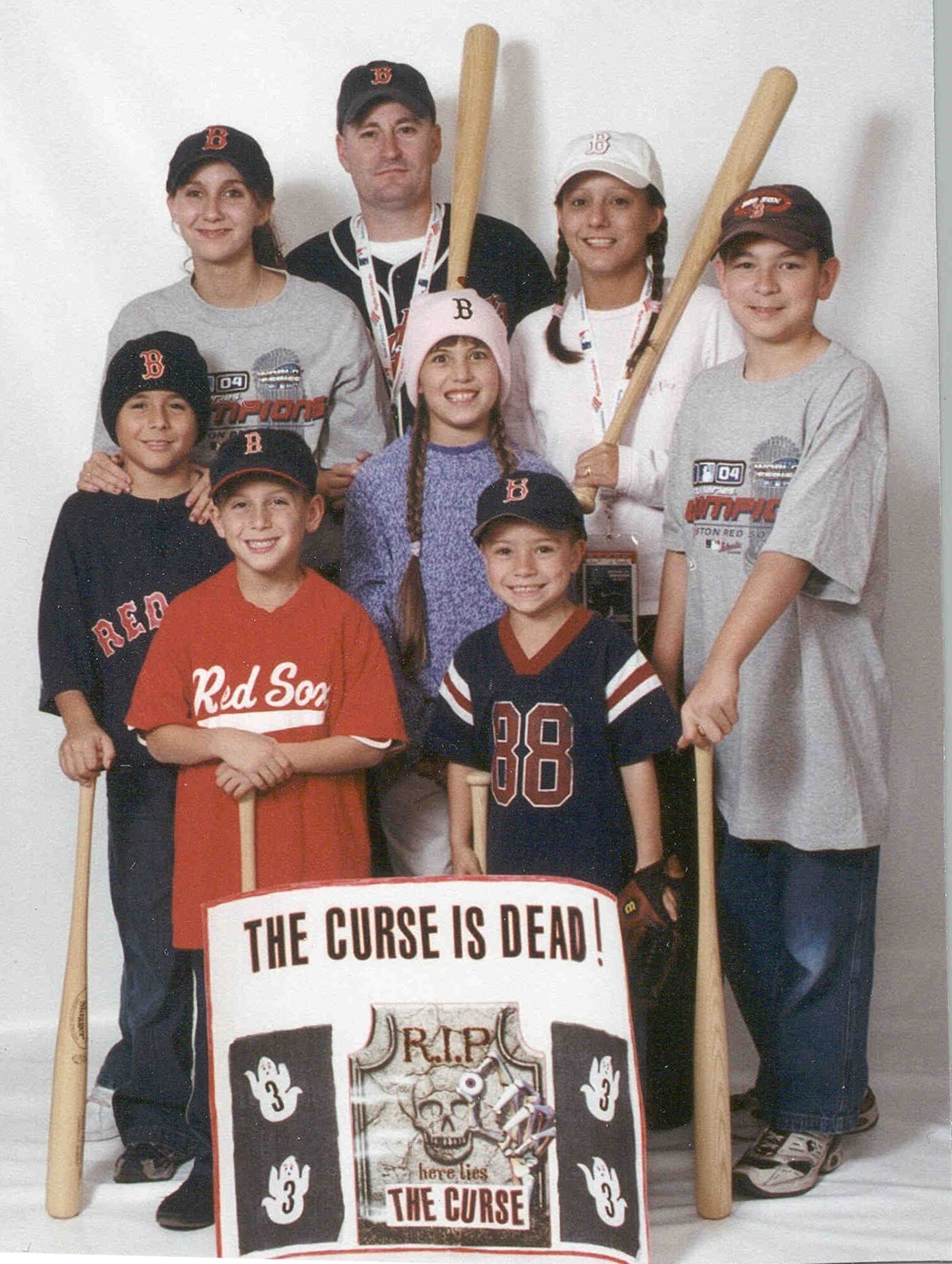 HANSCOM AIR FORCE BASE, Mass. - The Brister Family, from top left, niece Alyssa, Michael, Cheryl, and children Ebb, Dentin, Tristin, Leeza, and Cole, celebrate the 2004 Boston Red Sox World Series victory. (Courtesy photo)

