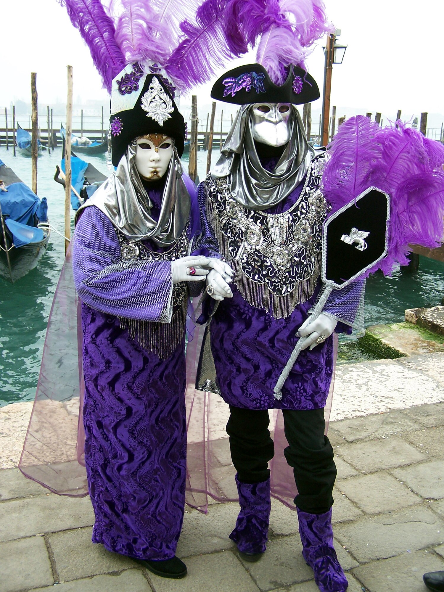 Partygoers dress in fancy costumes and walk around the streets posing for pictures during Carnevale (Photo by Senior Airman Sarah Gregory)