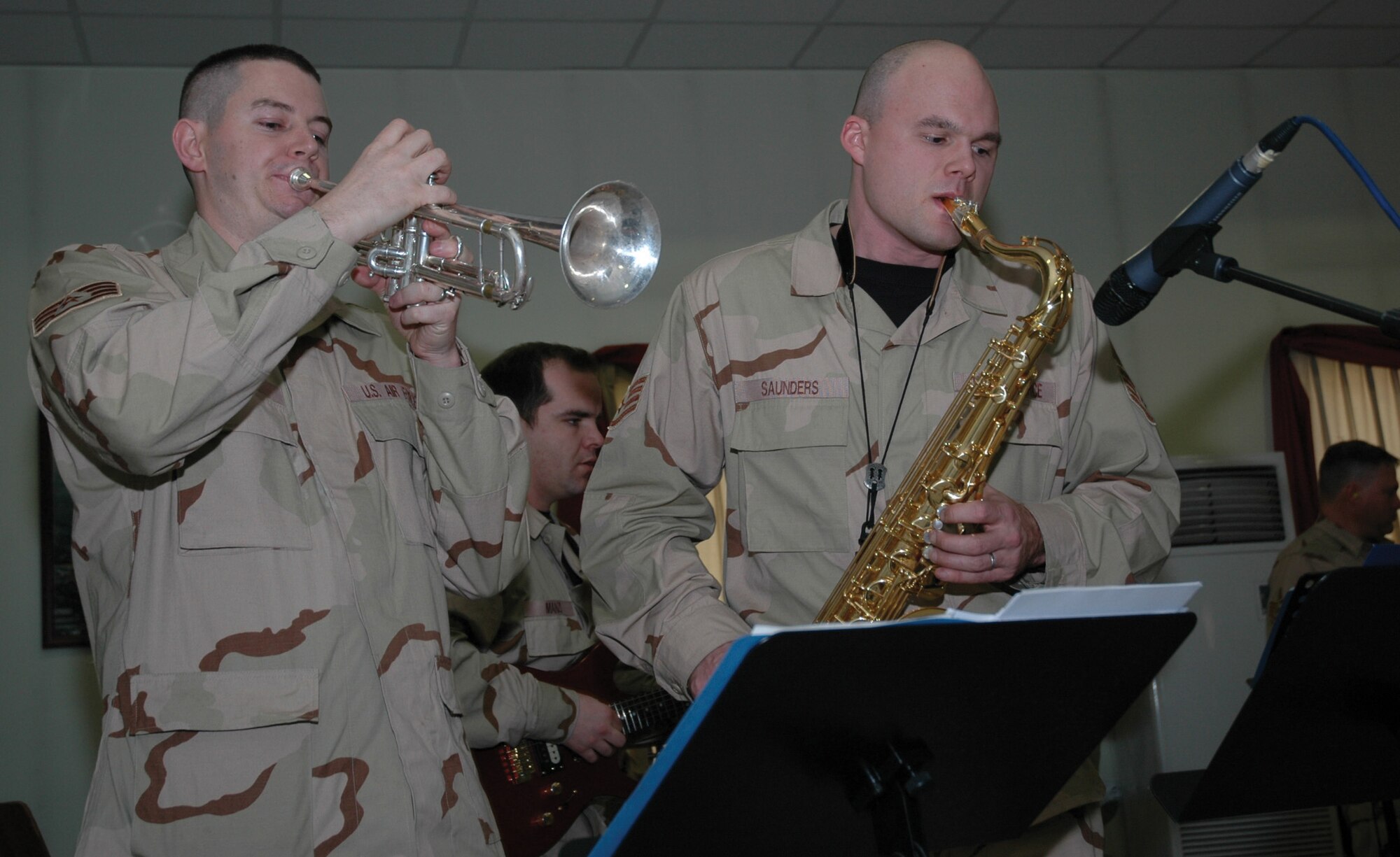 Staff Sgt. Shane Kibbey (left) and Staff Sgt. Jeffrey Saunders were part of the USAFE band ensemble "Direct Hit" that traveled downrange Feb. 8-10. (Photo by 1st Lt. Elizabeth Culbertson)