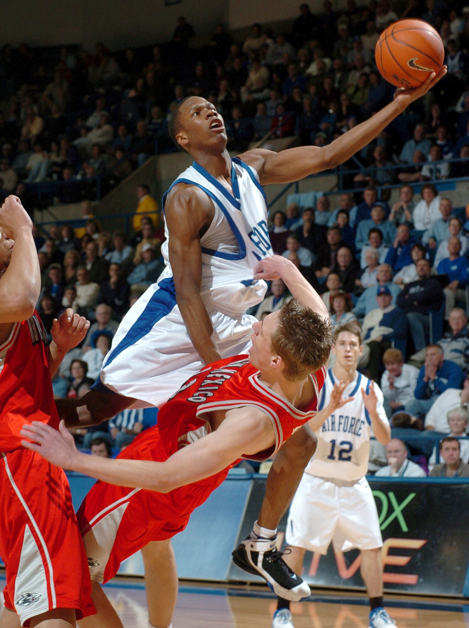 U.S. Air Force Academy senior Antoine Hood gets aggressive against New Mexico on Feb. 22. The Falcon’s will be making their second NCAA Tournament appearance in the last three years when the face off with Illinois at Cox Arena in San Diego, Calif., Thursday, Mar. 16.  (U.S. Air Force Photo by Joel Strayer)
