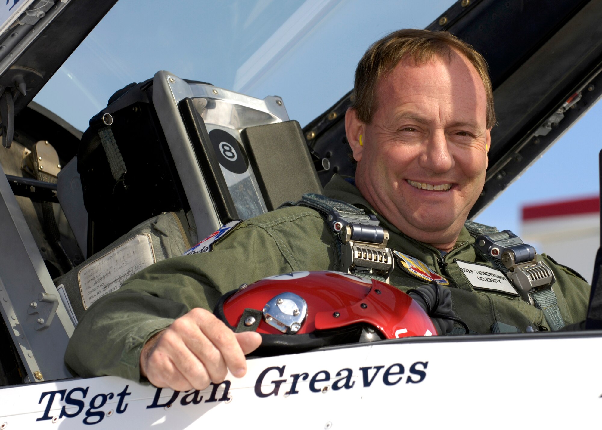Kenny Schrader, driver of the Air Force #21 Wood Brothers/JTG Racing Ford Fusion, is all smiles before his orientation flight with the Thunderbirds, Thursday, Mar. 9, 2006. (U.S. Air Force photo/Larry McTighe)