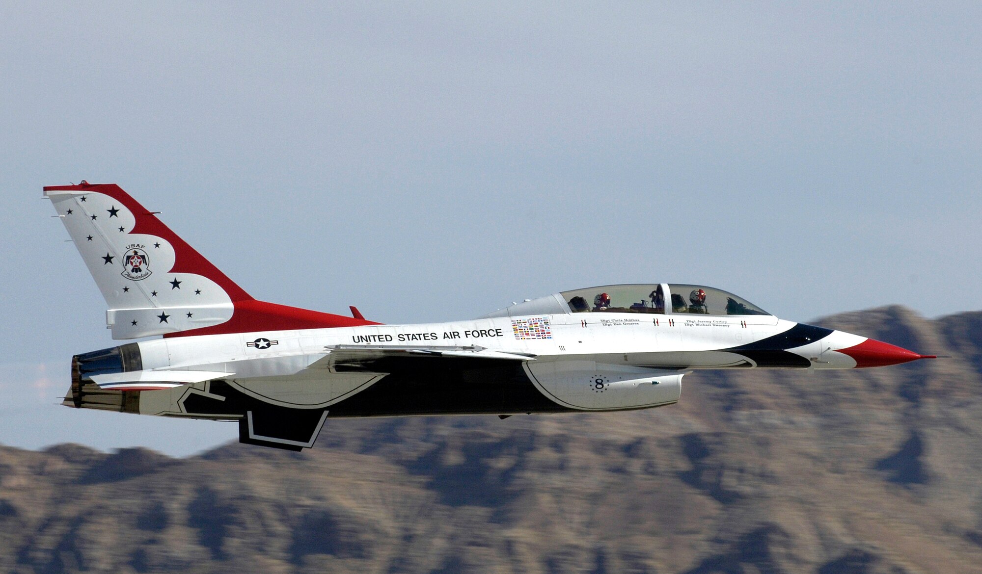 Capt. Tad Clark and Kenny Schrader, driver of the Air Force #21 Wood Brothers Ford Fusion, take off for an orientation flight in an F-16 Fighting Falcon Thunderbird, Thursday, Mar. 9, 2006.   Captain Clark is an advance pilot/narrator for the Thunderbirds. (U.S. Air Force photo/Larry McTighe) 