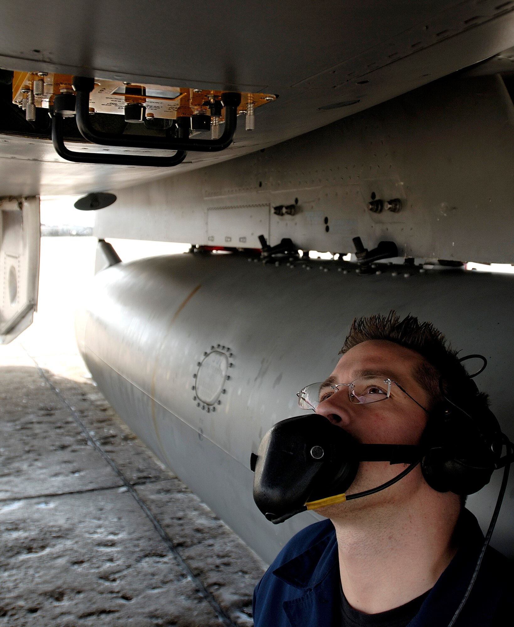 Staff Sgt. James Skonieczny inspects an F-15 Eagle Tuesday, March 14, 2006, at Langley Air Force Base, Va.  Sergeant Skonieczny is with the 71st Aircraft Maintenance Unit.  (U.S. Air Force photo/Airman 1st Class Christopher Ingersoll)

 

