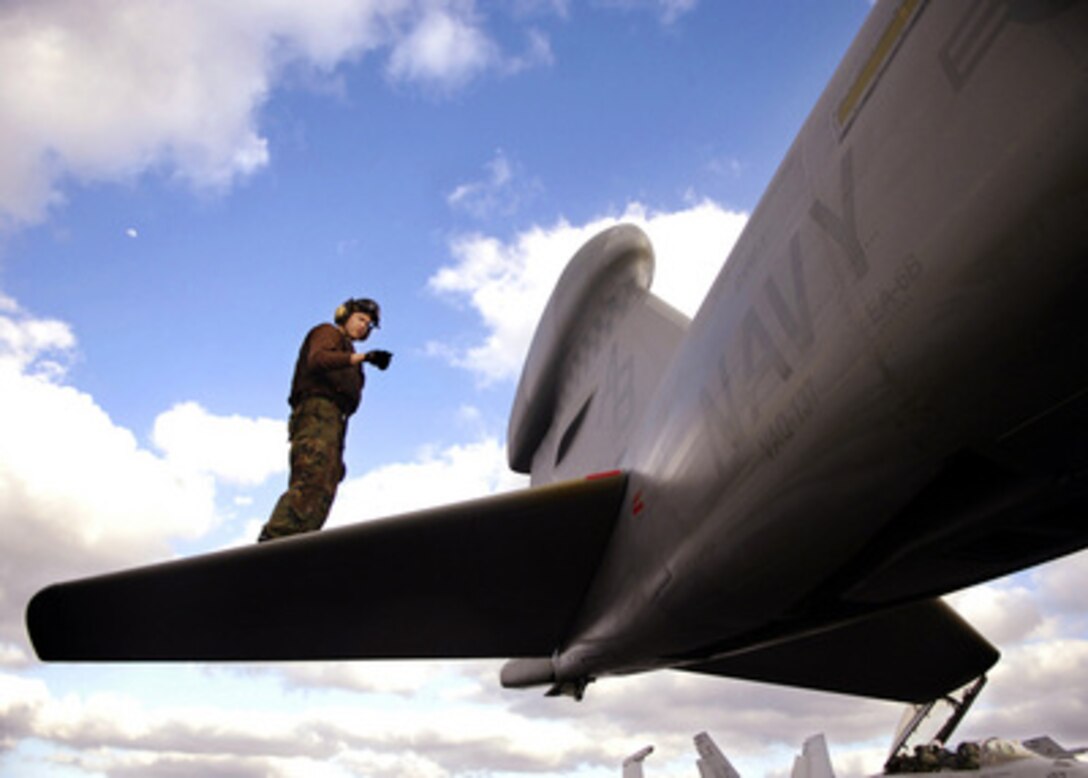 U.S. Navy Airman Lorne Horit inspects the horizontal stabilizers of an EA-6B Prowler aircraft on the flight deck of the aircraft carrier USS Enterprise (CVN 65), as the ship operates in the Atlantic Ocean on March 9, 2006. The all-weather Prowler provides protection for strike aircraft, ground troops and ships by jamming enemy radar, electronic data links, communications and obtains tactical electronic intelligence within the combat area. Horit and the Prowler are assigned to Tactical Electronic Warfare Squadron 137. Enterprise and its embarked Carrier Air Wing 1 are conducting a composite training unit exercise while under way in the Atlantic Ocean. 