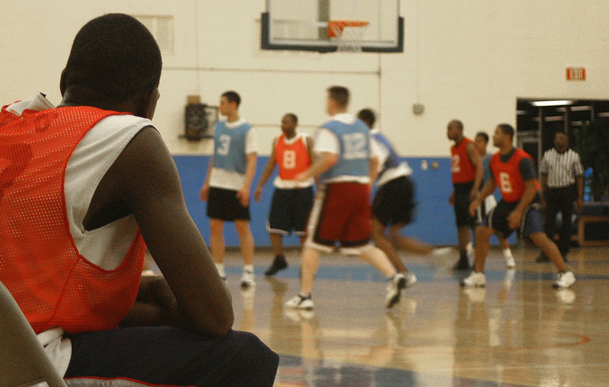 CANNON AIR FORCE BASE, N.M. -- James Pinchback takes a break from the basketball action while his team fights to stay in the playoffs. (U.S. Air Force photo by Airman Thomas Trower)
