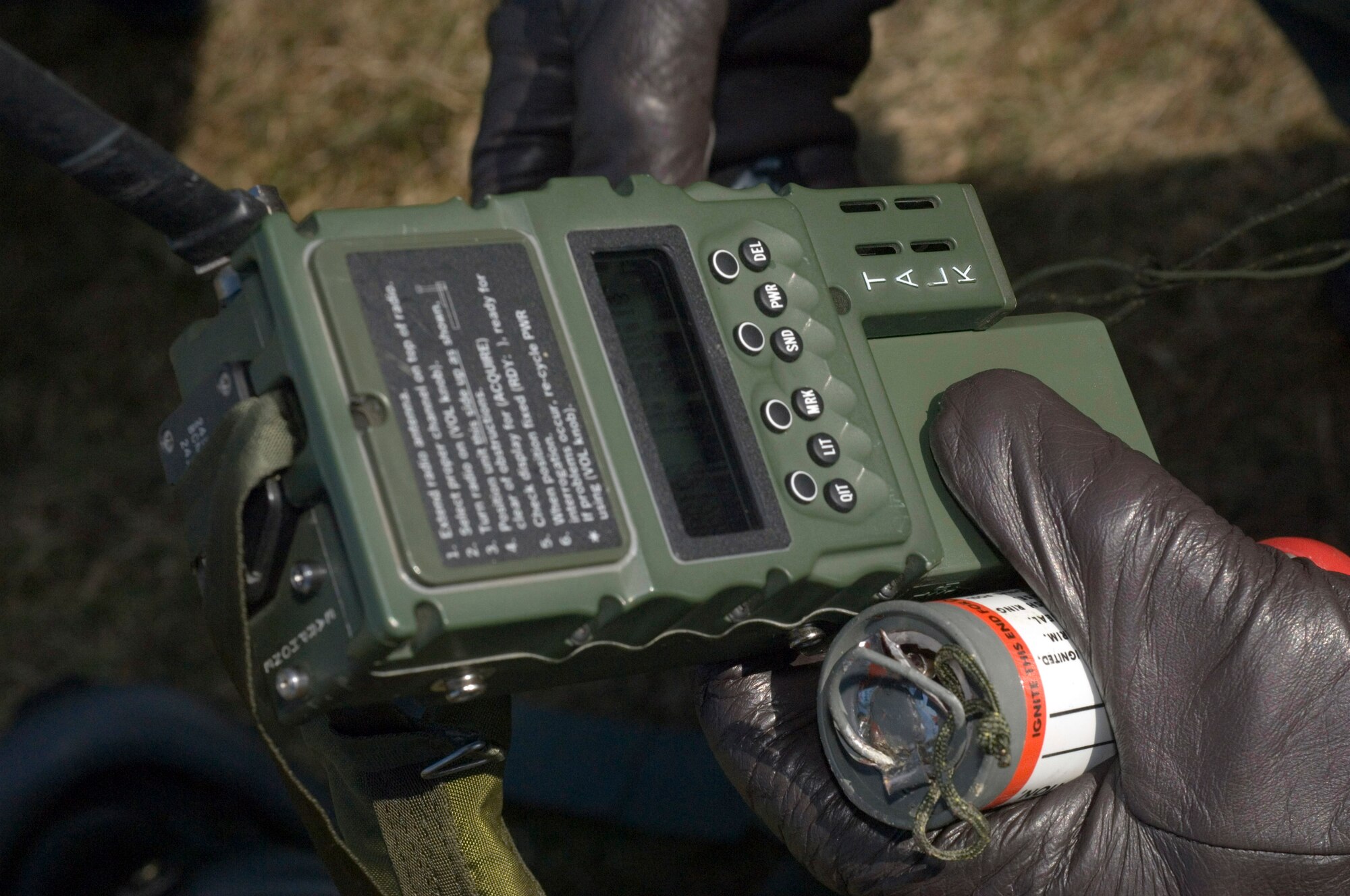 Aircrew members are shown how to use radios and signaling devices Monday, March 13, 2006 in Marpingen, Germany.  The 81st Fighter Squadron from Spangdahlem Air Base, Germany, and the 56th Rescue Squadron from Naval Air Station, Keflavik, Iceland, are participating in combat search and rescue training here.   (U.S. Air Force photo/Master Sgt. John Lasky)