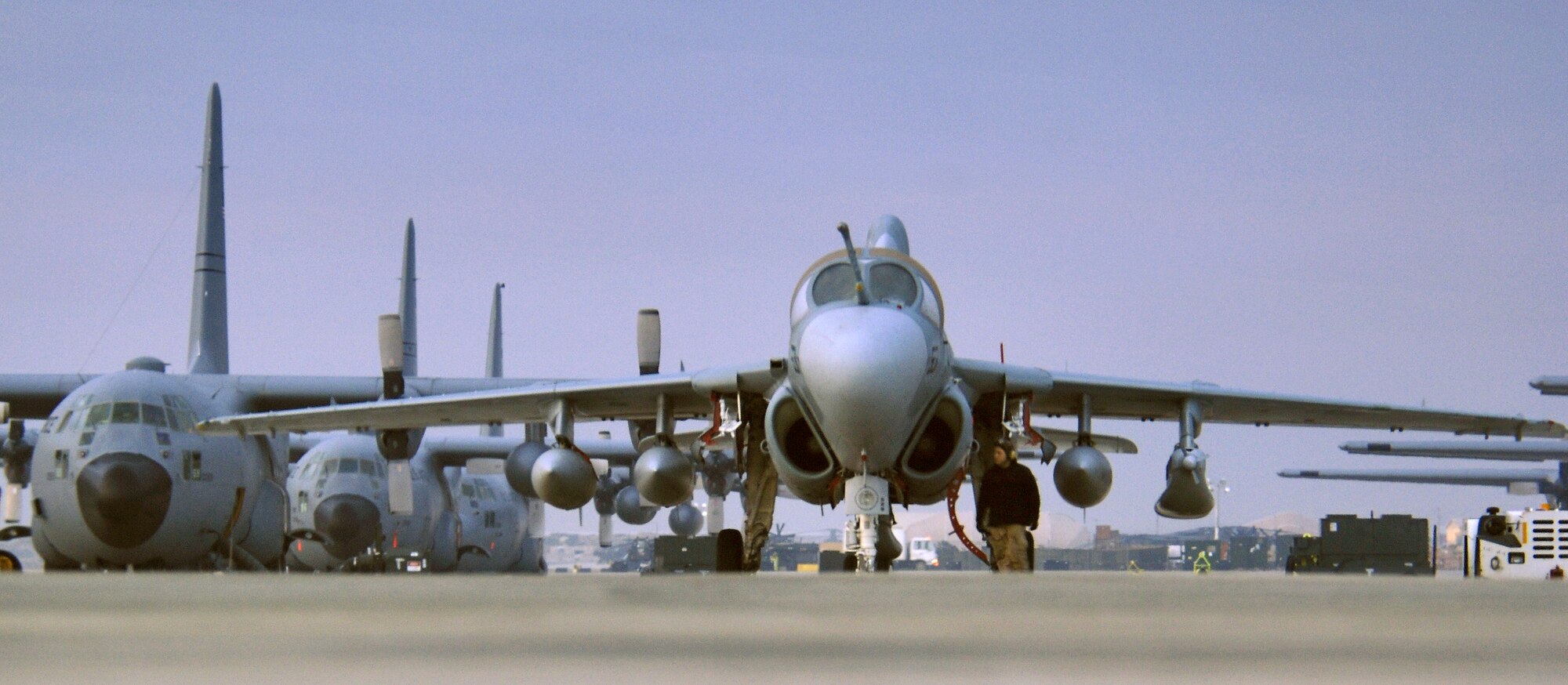EA-6B Prowler from Naval Air Station Whidbey Island, Wash., waits to launch Wednesday, March 8, 2006 for a dawn sortie from its deployed location at Bagram Air Base, Afghanistan. The squadron's mission is to dominate the enemy's electromagnetic spectrum through precise, lethal application of electronic attack. (U.S. Air Force photo/Master Sgt. Lance Cheung)