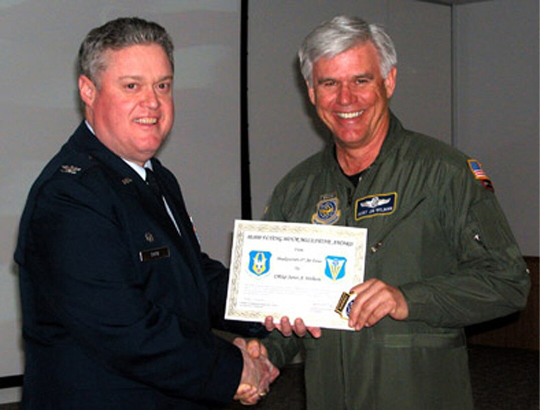 Chief Master Sgt. James Welborn, 314th Air Refueling Squadron program manager, was awarded the Air Mobility Command 10,000 hours Flying Award by Col. James Kerr, 940th Air Refueling Wing commander during a ceremony Feb. 11 at the 314ARS briefing room. The award was accompanied by a personal letter from Gen. Duncan McNabb, AMC commander. "This is a great milestone for 31 years of aviation service in both the KC-10 and KC-135," Chief Welborn said. 