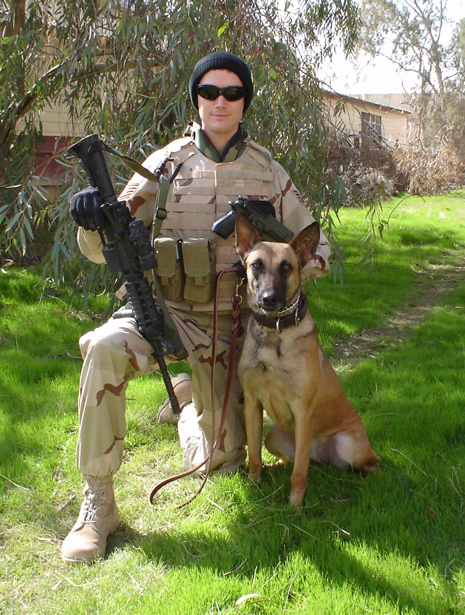 Katja, a 3-year-old Belgium Malinois weighing 63 pounds, is trained to attack and to detect the odor of explosives. She and Staff Sgt. Christopher McCleskey are with the 101st Airborne Division in Iraq assisting the Army in explosives detection. (Courtesy photo)