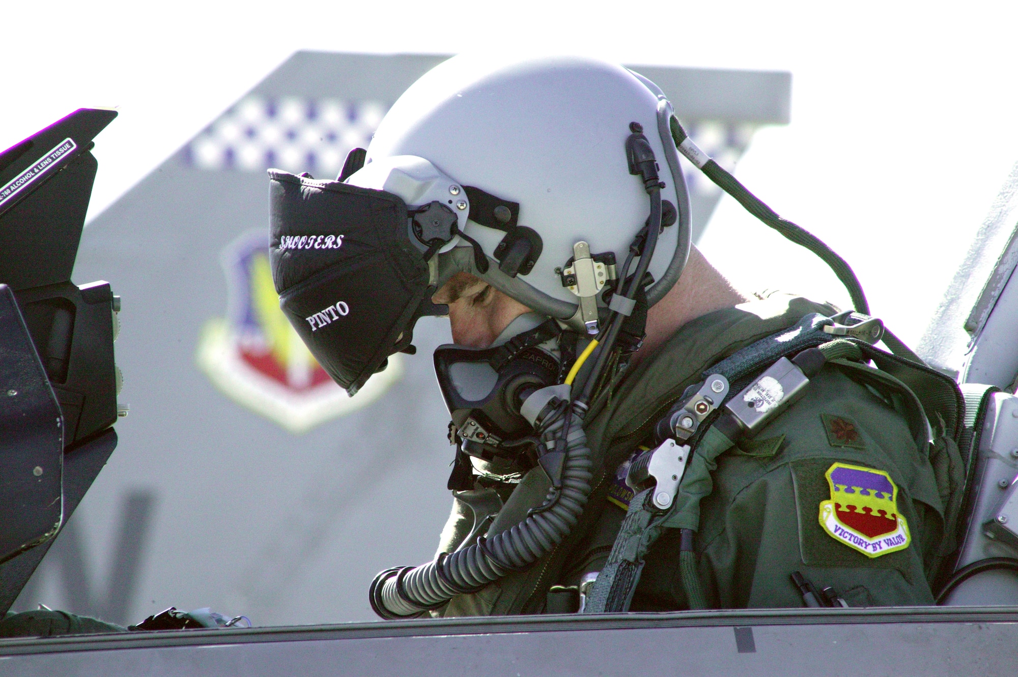 Maj. Mike Sadlowski performs pre-flight checks before taking off Wednesday, March 15, 2006, at Shaw Air Force Base, S.C. (U.S. Air Force photo)