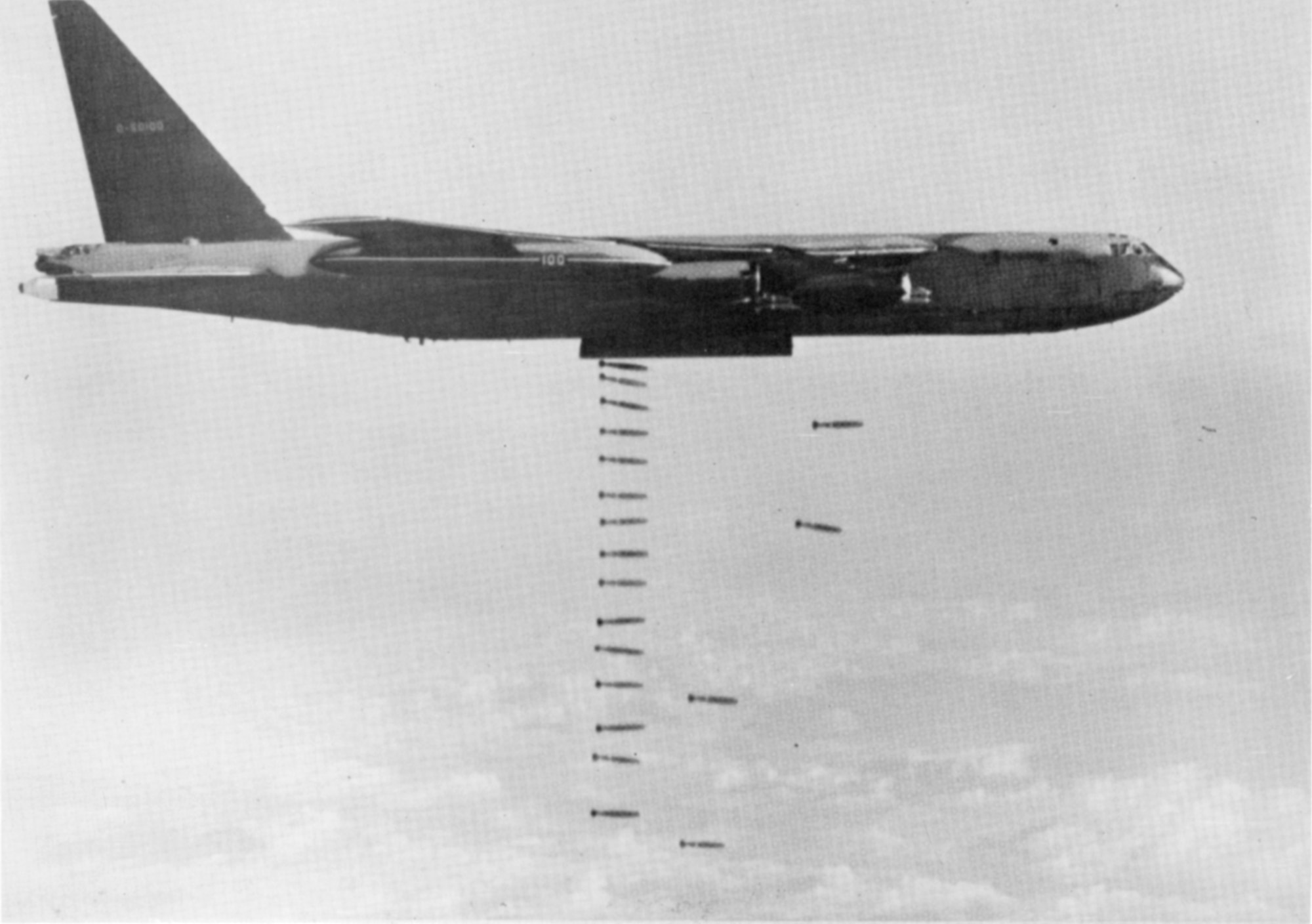 A B-52D Stratofortress from the 93rd Bombardment Wing at Castle Air Force Base, Calif., drops bombs. B-52Ds were modified in 1966 to carry 108, 500-lb bombs while the normal conventional payload before was only 51. (Historical U.S. Air Force photo)