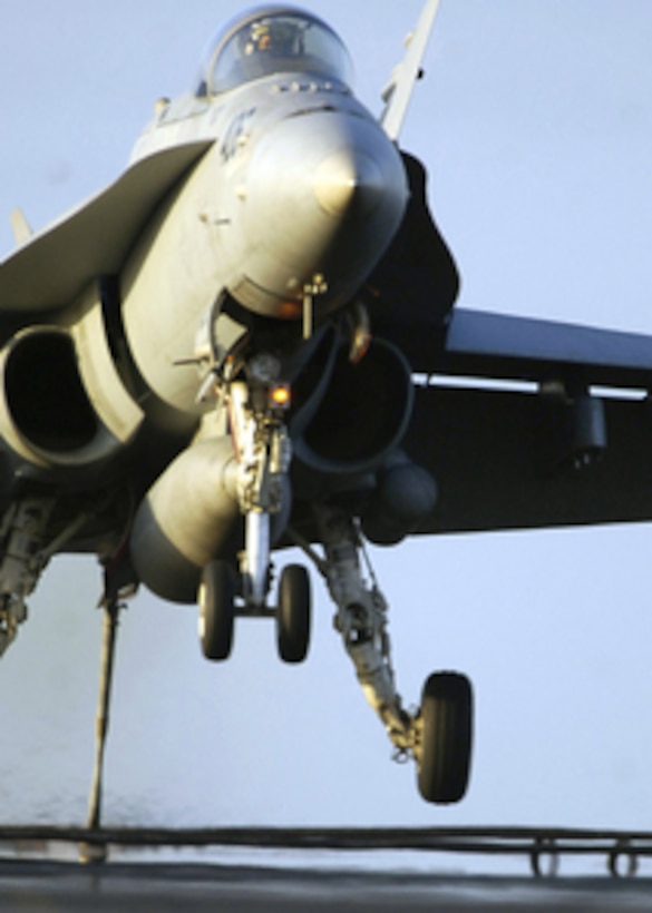 A Navy F/A-18C Hornet catches the wire with its tailhook as it lands on the flight deck of the aircraft carrier USS Enterprise (CVN 65) while the ship conducts flight operations in the Atlantic Ocean on March 13, 2006. Enterprise and its embarked Carrier Air Wing 1 are conducting a composite training unit exercise in the Atlantic. The Hornet and its crew are assigned Strike Fighter Squadron 86. 