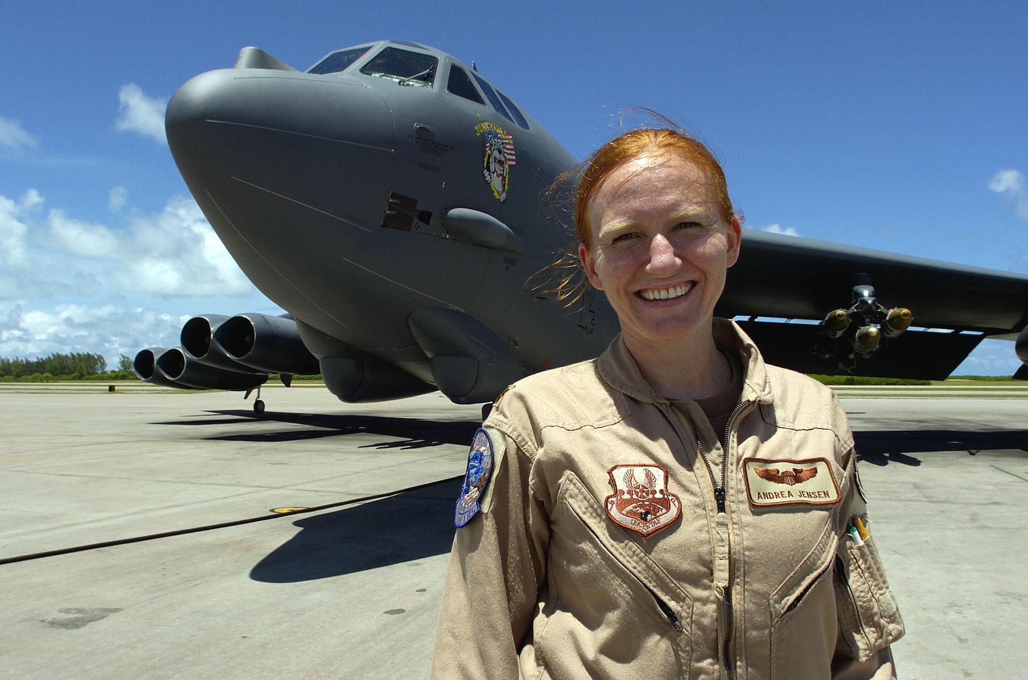 Maj. Andrea Jensen, 40th Expeditionary Group B-52 pilot, stands in front of a B-52 Stratofortress. Major Jensen has accumulated 100 combat flying hours providing close-air support for forces on the ground in Afghanistan. (U.S. Air Force photo/Senior Master Sgt. John Rohrer)