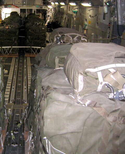 Pallets of humanitarian aid sit aboard an Air Force C-17 Globemaster III that airdropped 32,400 pounds of humanitarian aid within 40 minutes to four locations in central and eastern Afghanistan Thursday, March 16, 2006. The C-17 and accompanying aircrew are deployed to the 379th Air Expeditionary Wing at a forward-deployed location from McChord Air Force Base, Wash. (U.S. Air Force photo/Maj. Gabriel Greiss)