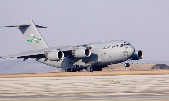 A C-17 Globemaster III lands at Spangdahlem Air Base, Germany, Wednesday, March 22, 2006. The transport, from McChord Air Force Base, Wash., will receive services from Spangdahlem's 726th Air Mobility Squadron. (U.S. Air Force photo/Master Sgt. John E. Lasky)