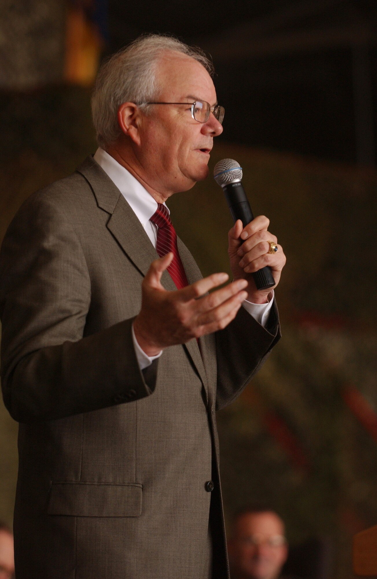 Secretary of the Air Force Michael W. Wynne speaks to Airmen Tuesday, March 21, 2006, during his visit to Osan Air Base, South Korea.  (U.S. Air Force photo/Airman Gina Chiaverotti)