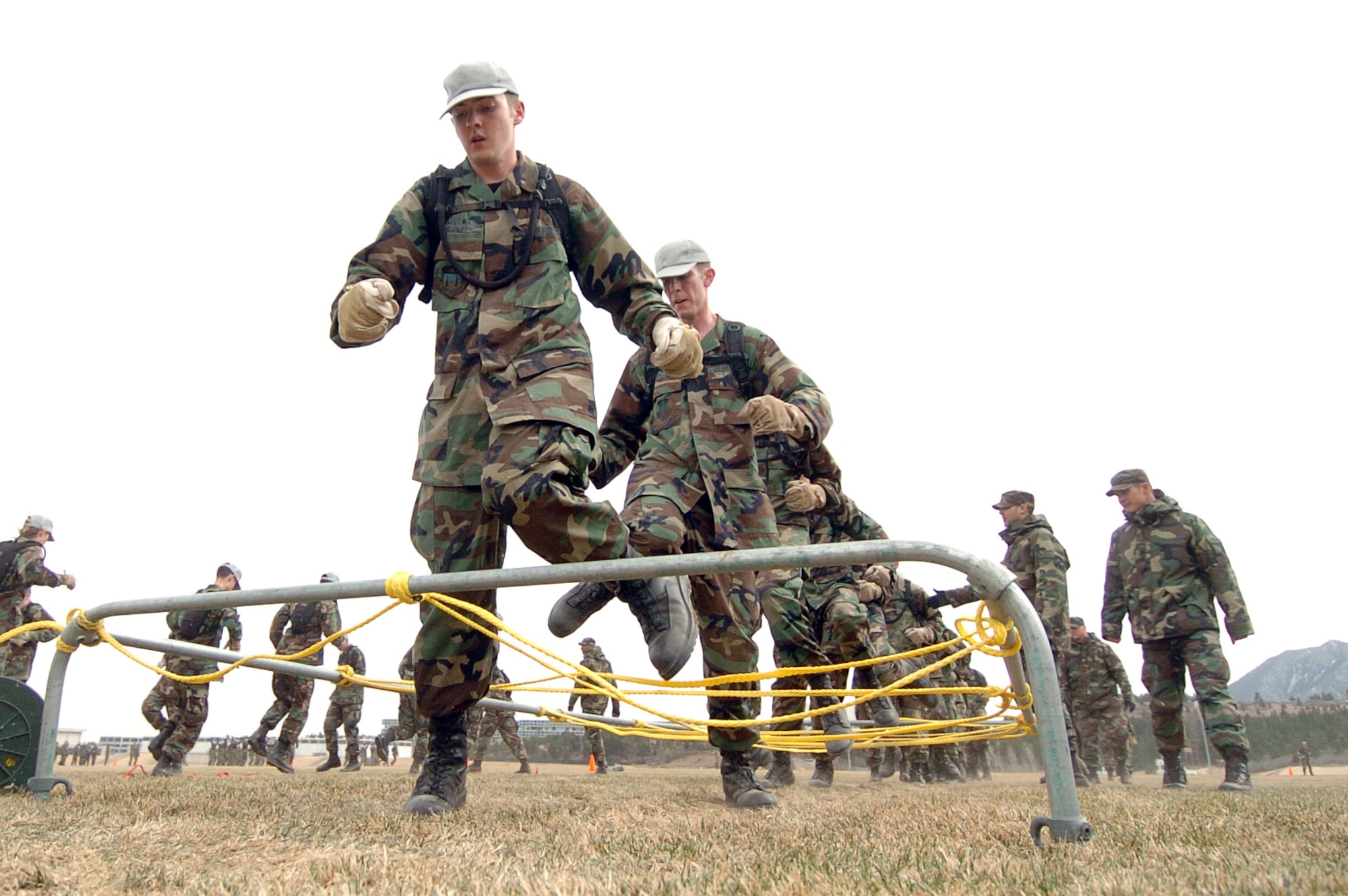 Cadet 4th Class Matthew Danley demonstrates some fancy footwork on the assault course during a training event at recognition Saturday, March 18, 2006, at the U.S. Air Force Academy, Colo. (U.S. Air Force photo/Charley Starr)


