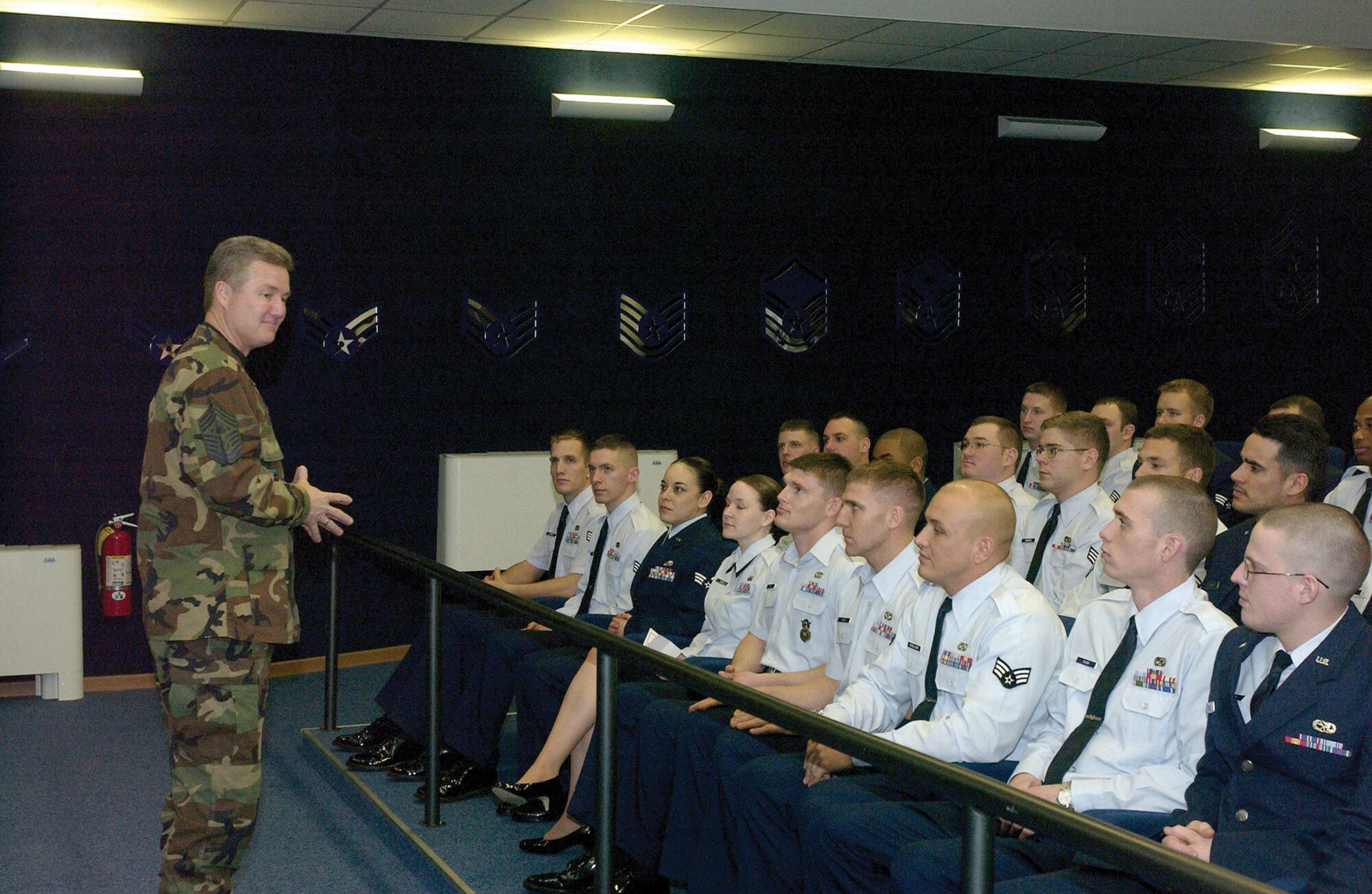 Chief Master Sgt. of the Air Force Gerald Murray talks to Airmen at the Airman Leadership School during his visit to Aviano Monday. Chief Murray held several briefings that discussed the future of the Air Force and he also thanked Airmen for their service.  Photo by Airman Liliana Moreno  
