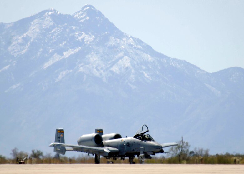 An A-10 Thunderbolt II taxis down the runway as it arrives at Davis-Monthan Air Force Base, Ariz., Wednesday, March 22, 2006, to kick off the beginning of "Hawgsmoke 2006," the 30th anniversary of the Warthog. Hawgsmoke is a biennial bombing and tactical gunnery competition of the A-10, in which 20 squadrons worldwide come together to fly the Warthog and compete for the honor of the "Best of the Best" in ground attack and target destruction. (U.S. Air Force photo/Senior Airman Christina D. Ponte)