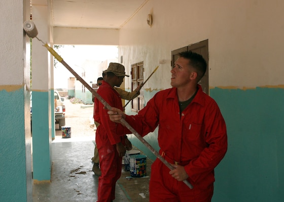 Lance Cpl. Adam Bautz, of Brocton, N.Y., a machine gunner with Charlie Co, BLT 1/2, participates in a community relations project during Exercise Image Nautilus 06 in Djibouti, Africa. The Marines of BLT 1/2 participated in the bi-lateral training Image Nautilus 06 this past week in the east African country of Djibouti.