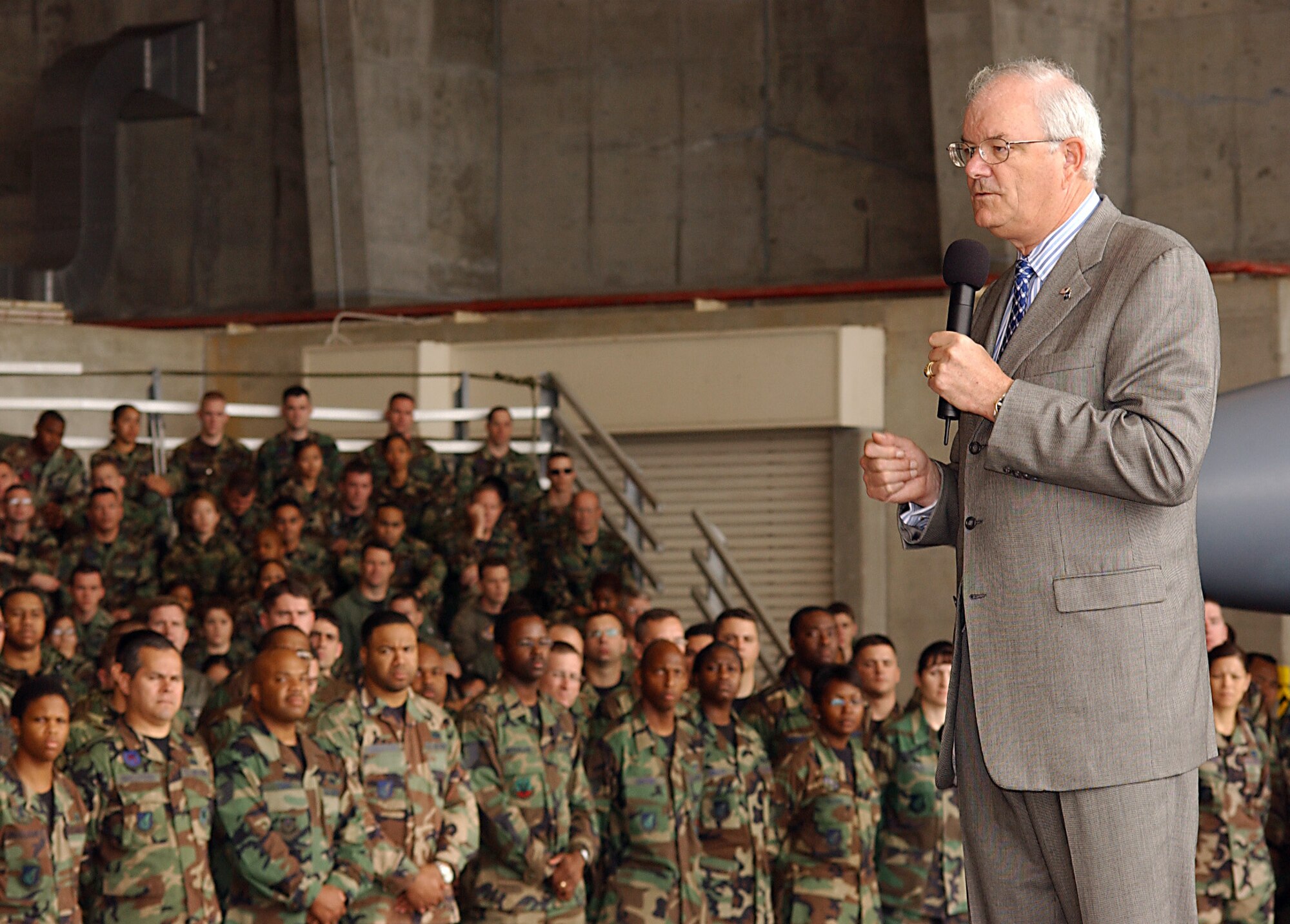 Secretary of the Air Force Michael W. Wynne speaks to Airmen during his base tour of Kadena Air Base, Japan, Thursday, March 23, 2006.  Secretary Wynne spent two days at the Air Force's largest combat wing as part of his tour of bases in the Pacific theater. (U.S. Air Force photo/Airman 1st Class Stephanie Sinclair)