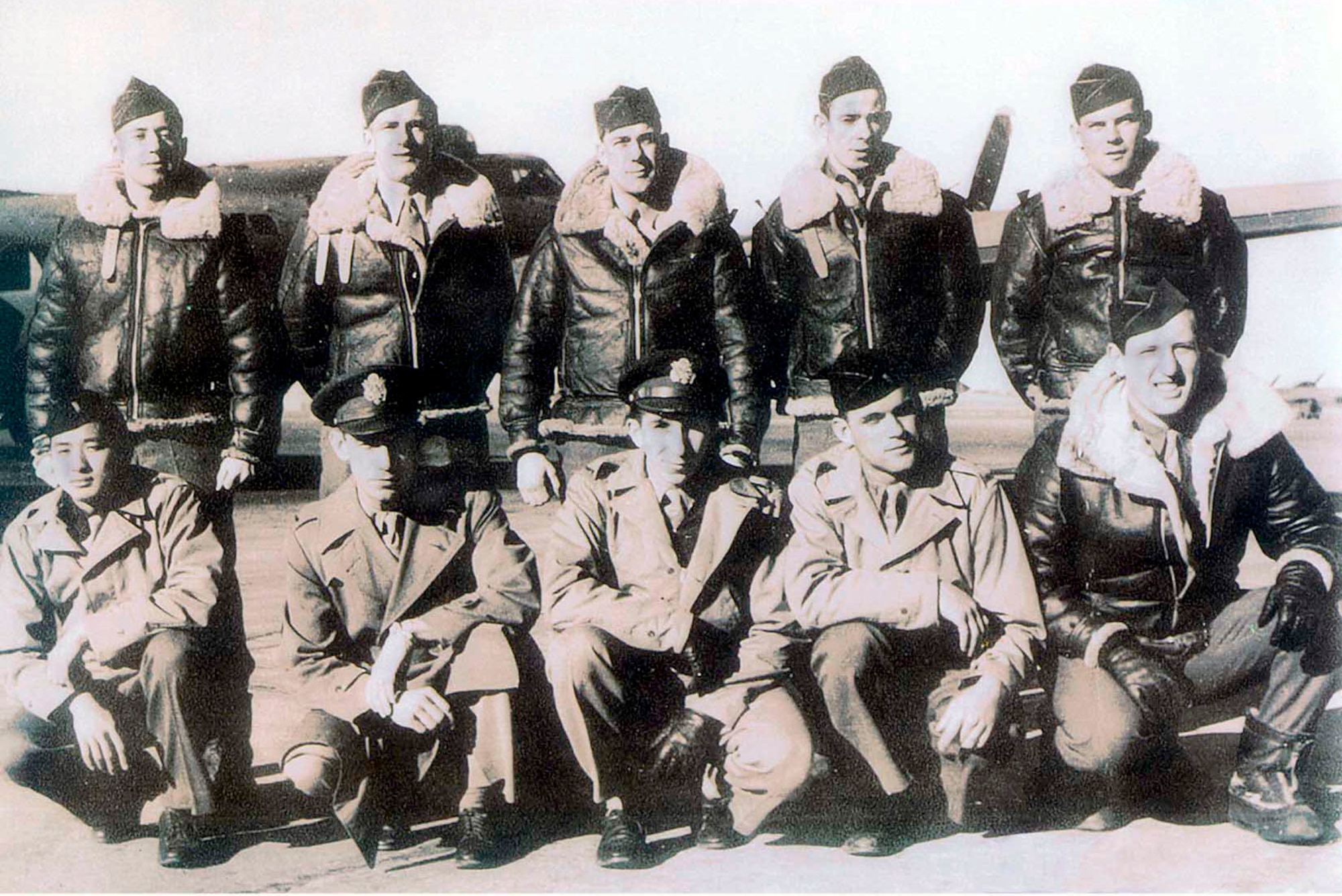 First Lt. Leo Bach (front, center) poses with aircrew members from the 381st Bomb Group. All crewmembers on Lieutenant Bach's B-17 Flying Fortress survived the attack from the German Luftwaffe. (Courtesy photo)