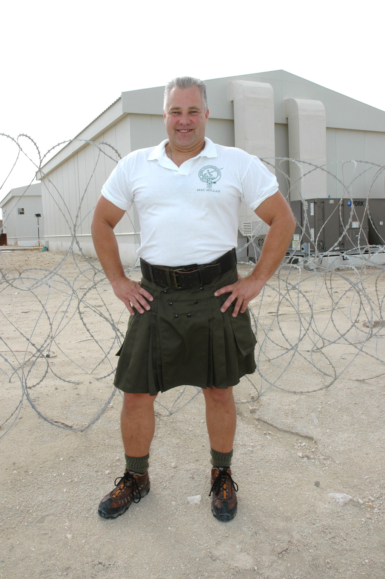 Sporting his kilt in Southwest Asia, Senior Master Sgt. Todd Flickinger, 746th Expeditionary Airlift Squadron, recently defended his stateside title of "Best Legs in a Kilt." (U.S. Air Force photo/Senior Airman Mark R.W. Orders-Woempner)
