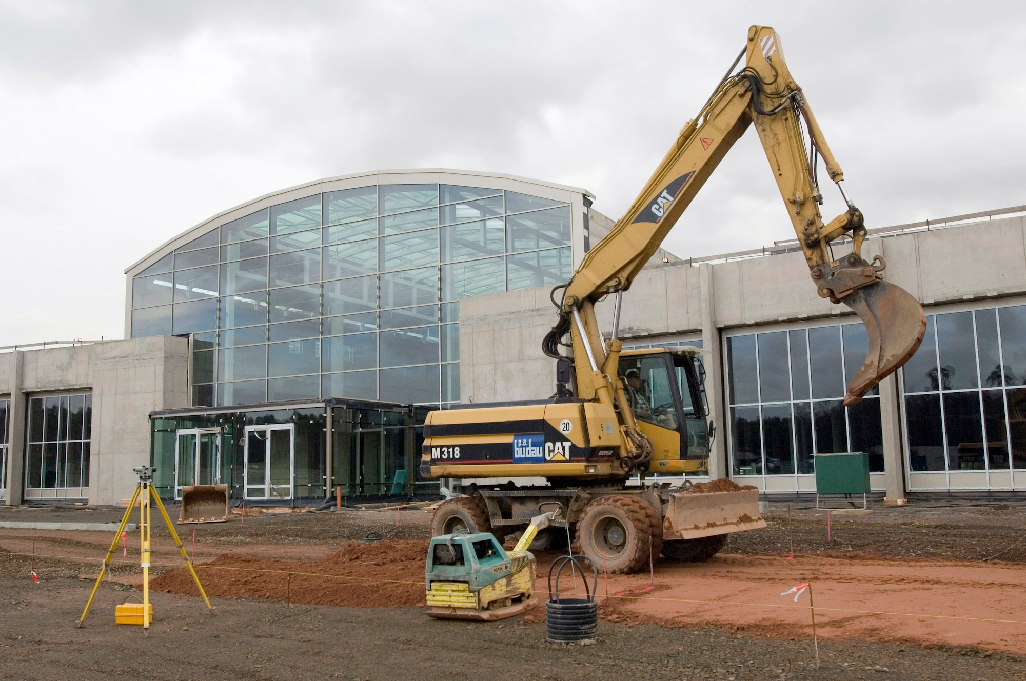 Construction continues in front of the west entrance to the Kaiserslautern Military Community Center's at Ramstein Air Base, Germany, on Tuesday, March 28, 2006.  The 840,000-square-foot facility will include an eight-story, 350-room hotel slated to open in September and the shopping mall in early 2007. (U.S. Air Force photo/Master Sgt. John E. Lasky)
