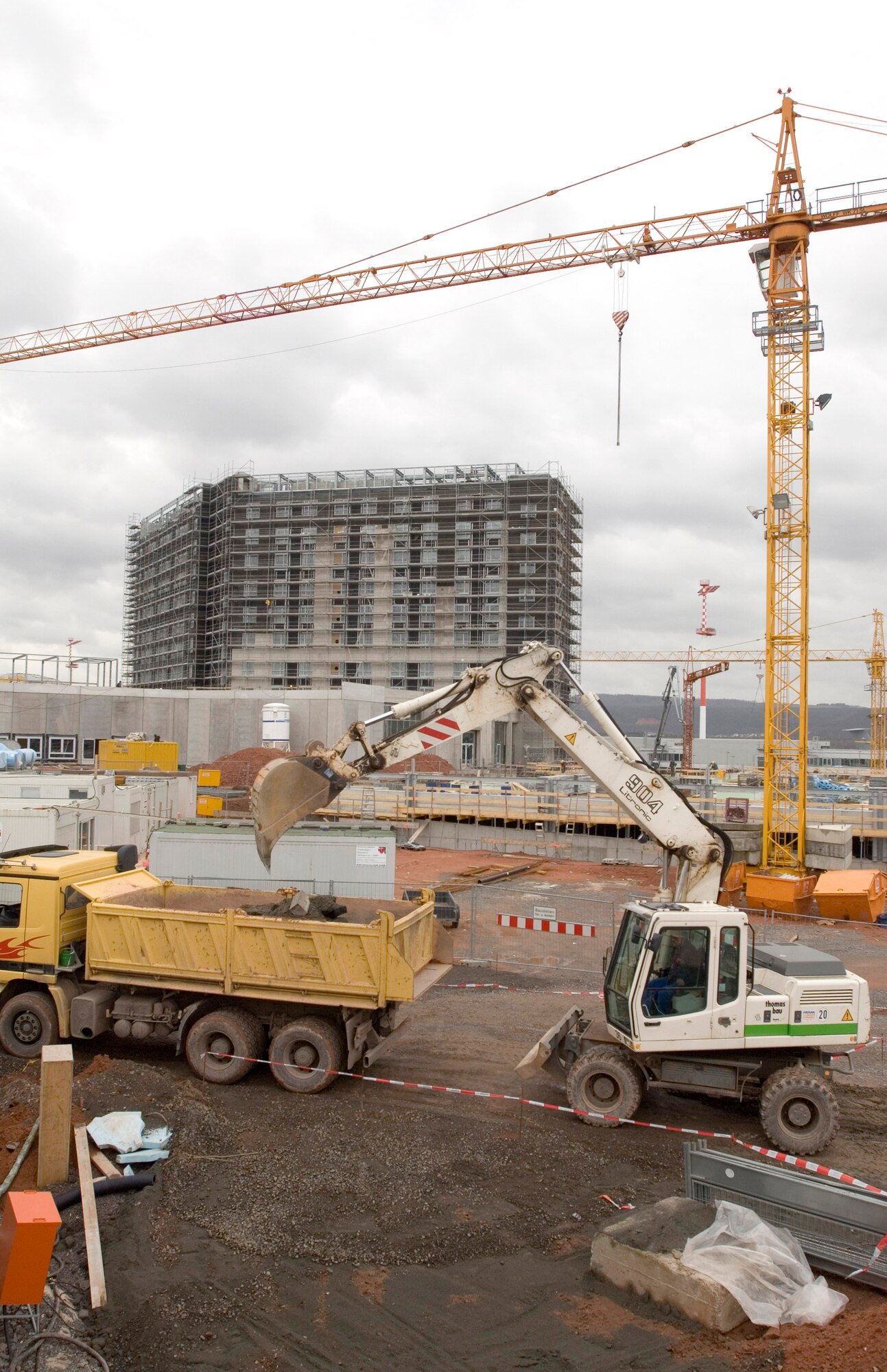 The hotel stands tall over the Kaiserslautern Military Community Center's construction site at Ramstein Air Base, Germany, on Tuesday, March 28, 2006. The 350-room visitors billeting is slated to open in September and the shopping mall in early 2007. (U.S. Air Force photo/Master Sgt. John E. Lasky)
