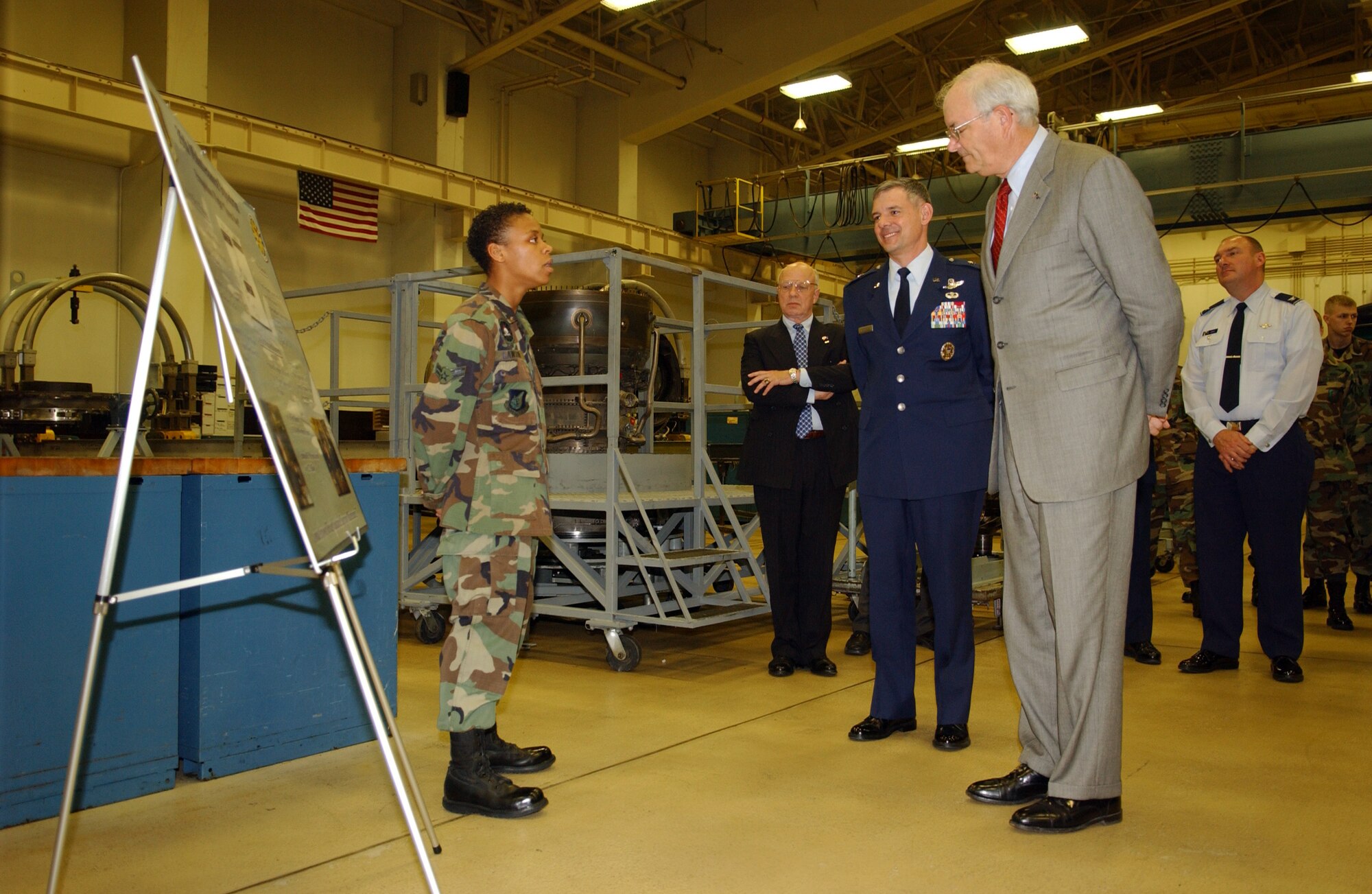 Airman 1st Class Chakeyta Lawson briefs Secretary of the Air Force Michael W. Wynne and 35th Fighter Wing commander, Brig. Gen. Salvatore Angelella during the SECAF's visit to Misawa Air Base, Japan, on Saturday, March 25, 2006. (U.S. Air Force photo/Tech. Sgt. Andy Bellamy) 