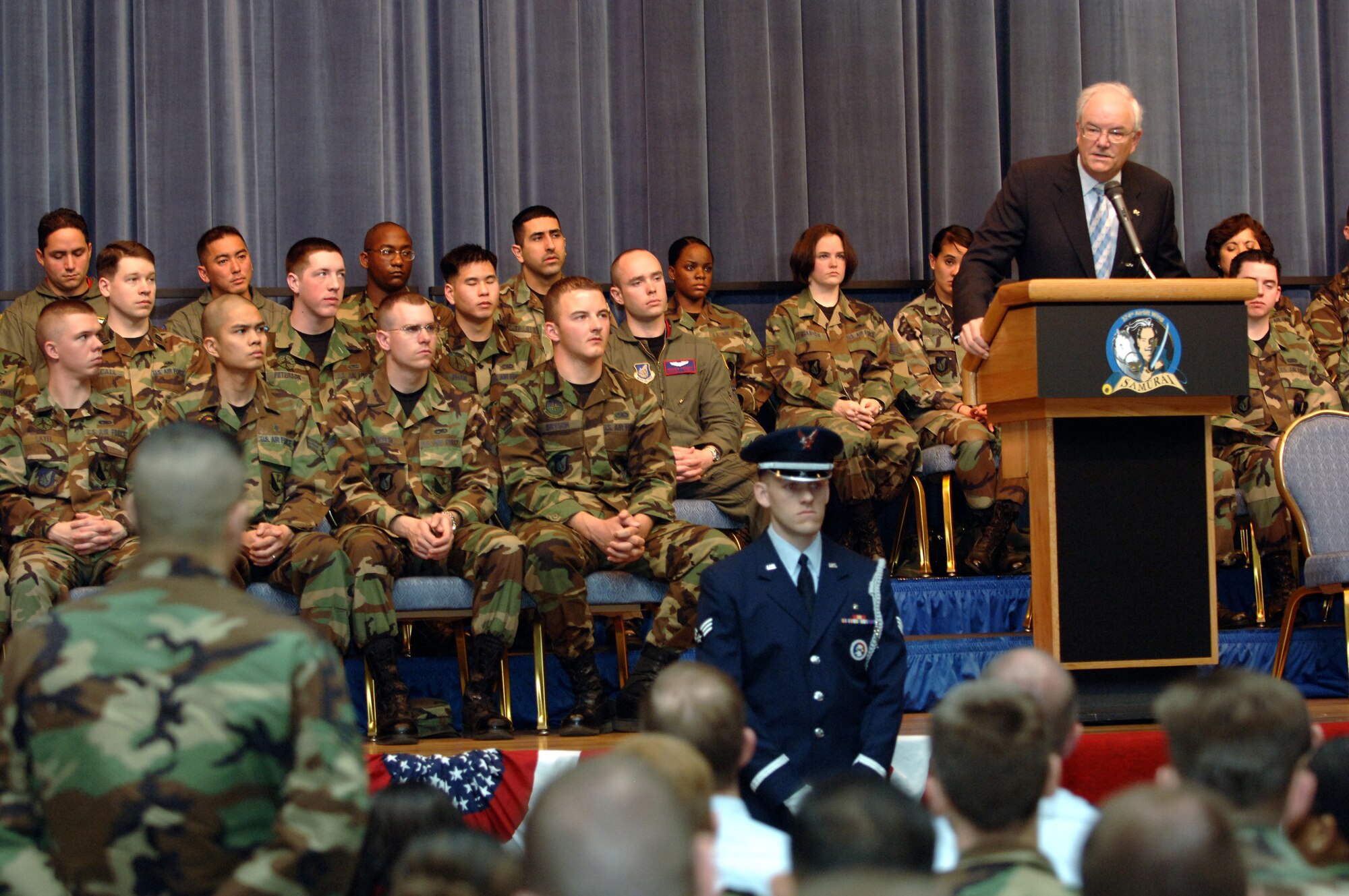 Secretary of the Air Force Michael W. Wynne speaks to Airmen during his tour of Yokota Air Base, Japan, on Friday, March 24, 2006. Secretary Wynne spent two days at Yokota as part of his tour of bases in the Pacific theater. (U.S. Air Force photo/Yasuo Osakabe)