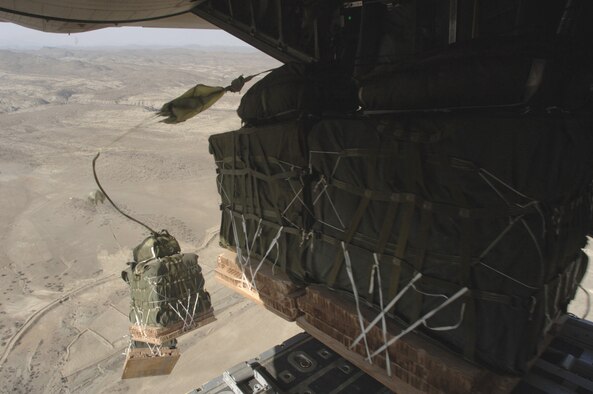 Containerized delivery system pallets roll out of a C-130 Hercules aircraft near the Pakistan border Thursday, March 9, 2006. The aircraft and most of its crew are deployed to the 774th Expeditionary Airlift Squadron, Bagram Air Base, Afghanistan, from the Oklahoma Air National Guard's 185th Airlift Squadron. Airdrops like these bring supplies to those in need. (U.S. Air Force photo/Master Sgt. Lance Cheung)