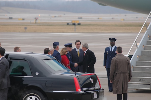 President George W. Bush landed at the 911th Airlift Wing, Air Reserve Station, March 24, to attend a fund-raiser for Senator Rick Santorum.  The 911th AW greeting party included Colonel Randal L. Bright, commander;  Mrs. Amy Bright;  and Colonel Steven R. Clayton, 911th Operations Group commander.