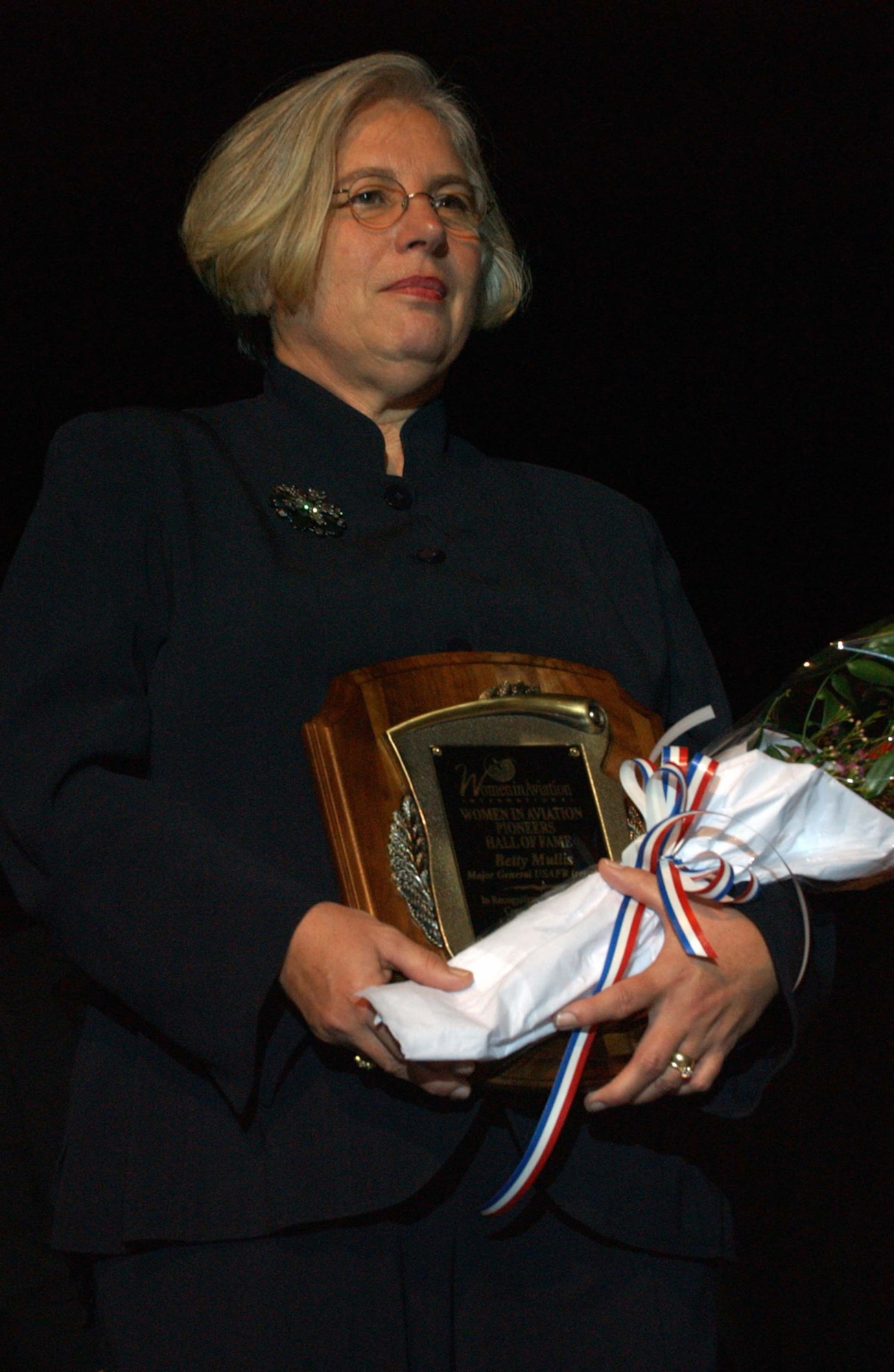On Saturday March 25, 2006 during the closing banquet of the 17th annual International women in Aviation Conference, Major General USAFR (retired) Betty Mullis was among the five inducted into the WAI Pioneer Hall of Fame. The hall of fame was established in 1992 to honor women who have made significant contributions as pioneers or inovators. Photo by TSgt Lucia Hopkins (RELEASED)                         