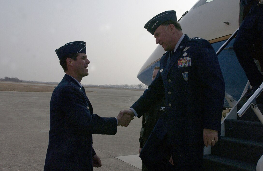Brig. Gen. Robert Yates, 31 Fighter Wing commander, greets Gen. William Hobbins, U.S. Air Forces in Europe commander, who was visiting Aviano March 20. (US Air Force photo by Airman Liliana Moreno) 