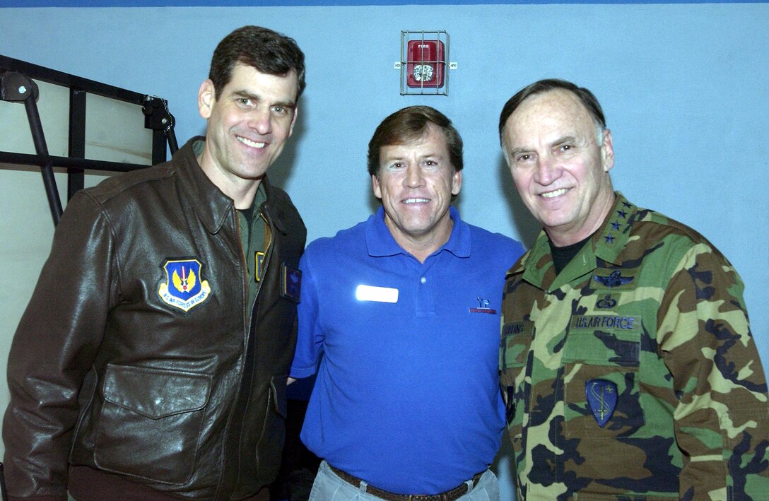 Gen. William Hobbins, U.S. Air Forces commnander, and Brig. Gen. Robert Yates, 31st Fighter Wing commander, take a moment to pose with Dave Labonte, Youth Center Director at the Child Development Center here March 20. (U.S. Air Force photo by Airman Liliana Moreno) 