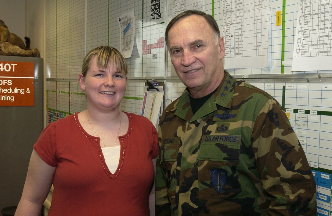 Gen. William Hobbins, U.S. Air Forces in Europe commander, poses with Redenna Baker, 510th Fighter Squadron, March 20, 2006. (U.S. Air Force photo by Airman Liliana Moreno) 
