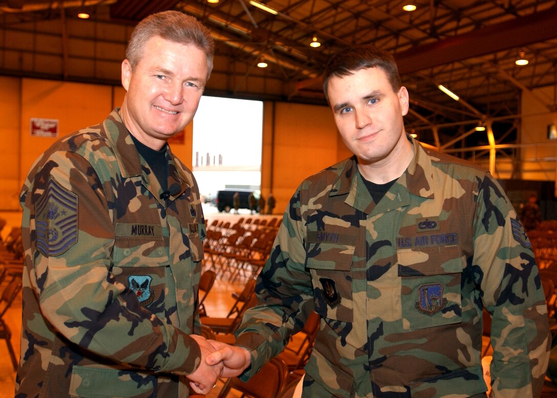 Chief Master Sgt. of the Air Force Gerald Murray shakes hands with Staff Sgt. Albert Smyth, 48th Communications Squadron, during the chief’s visit to RAF Lakenheath March 10. 