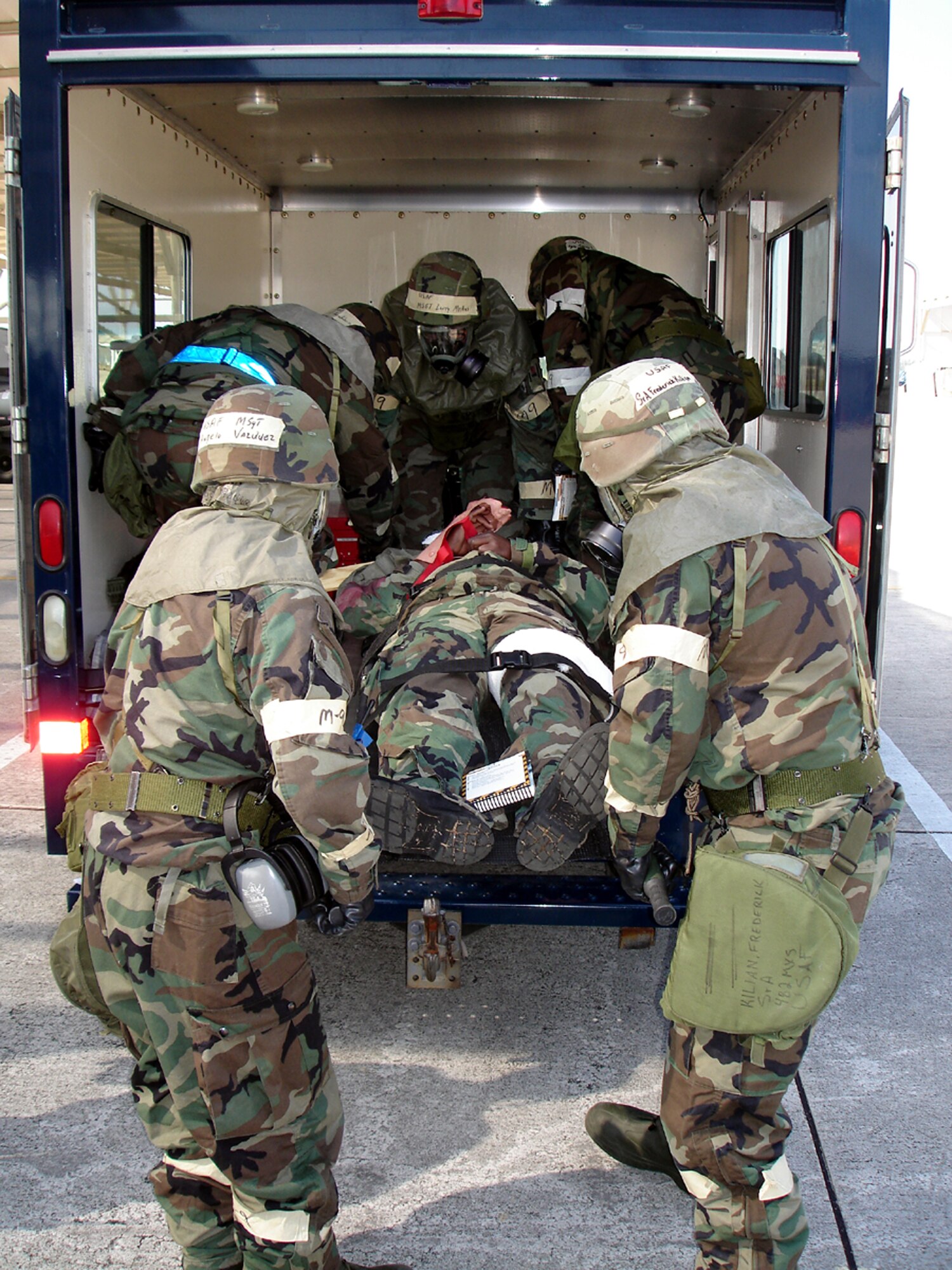 Airmen assigned to Homestead ARB's post-attack recon teams had to search for the wounded, perform first aid and evacuate the “victims” wearing a full ensemble of protective equipment during a recent Operational Readiness Exercise (U.S. Air Force Reserve photo by Jake Shaw).