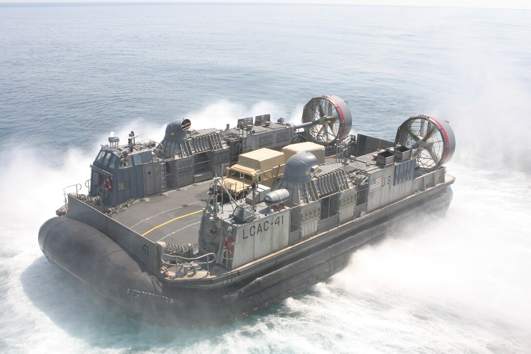 A Landing Craft Air Cushioned debarks from the USS Iwo Jima during the 24th Marine Expeditionary Unit's Expeditionary Strike Group Exercise March 29, 2006.