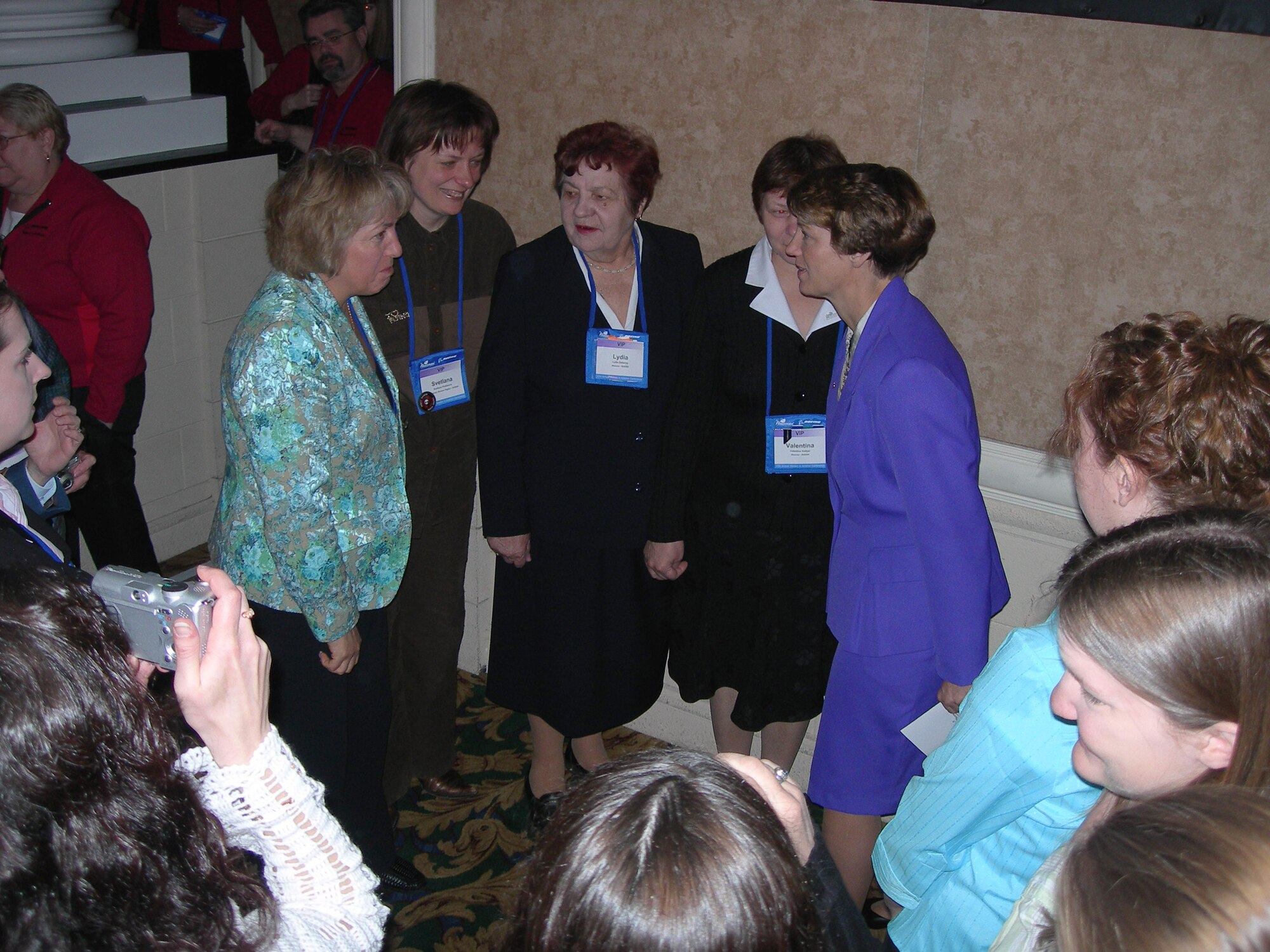 Retired Air Force Col. Eileen Collins, right, talks with Russian pilots attending the 17th Annual International Women in Aviation Conference in Nashville, Tenn., on Saturday, March 25, 2006. (U.S. Air Force photo/Annette Crawford)