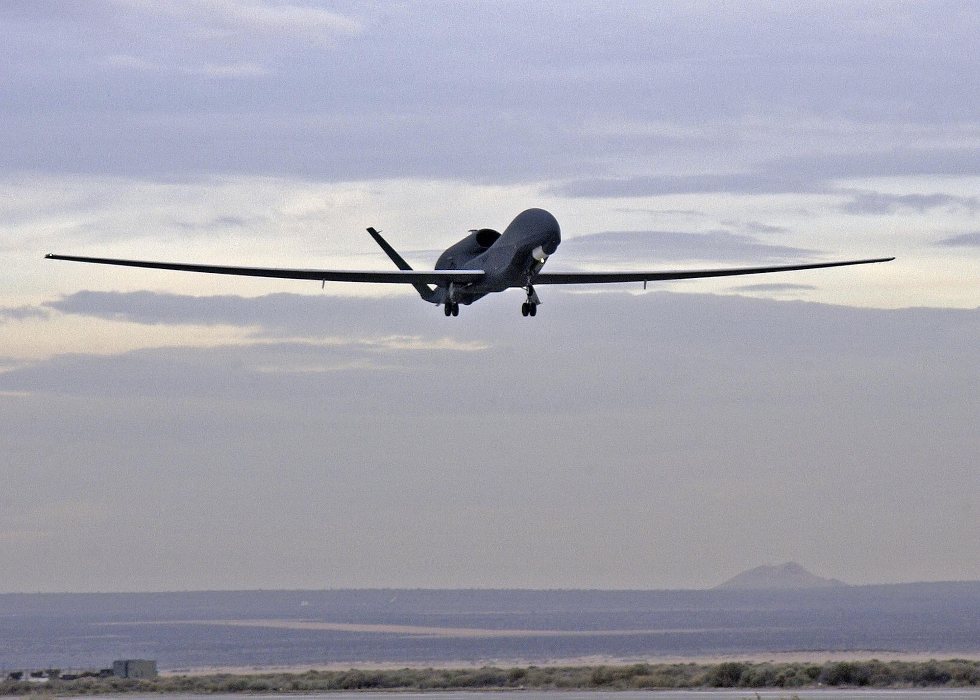 EDWARDS AIR FORCE BASE, Calif. - Global Hawk N-1, an RQ-4A unmanned aerial vehicle, takes off from the Edwards runway March 27 for a one-way mission to Naval Air Station Patuxent River, Md. N-1 is the first Global Hawk delivered to the U.S. Navy. (Air Force photo by Chad Bellay)

