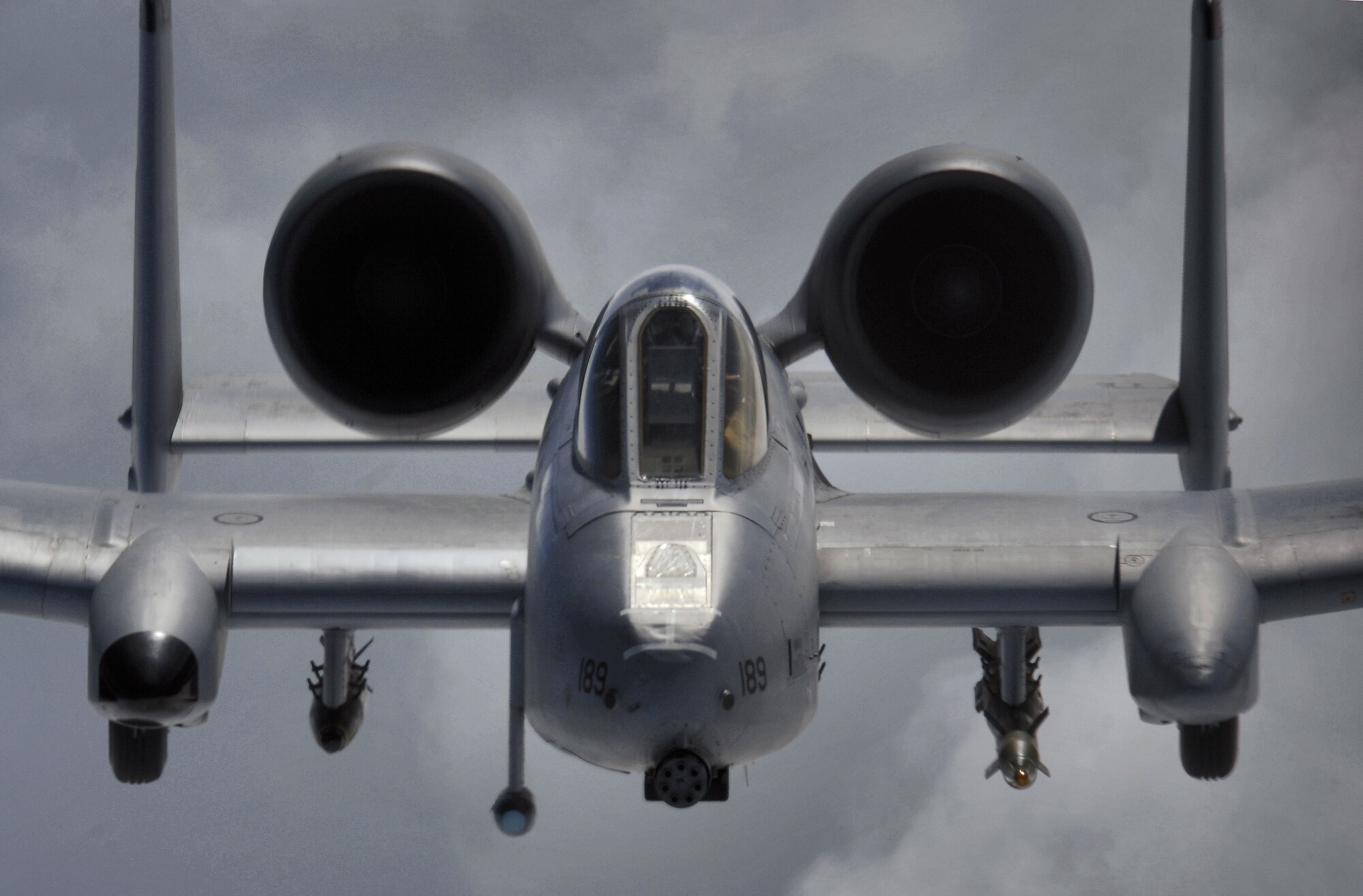 Capt. Andrew Quinn flies his OA/A-10 Thunderbolt II observation/attack aircraft to a refueling position behind a KC-135 Stratotanker over Afghanistan on Sunday, March 26, 2006.  Captain Quinn is deployed to the 355th Expeditionary Fighter Squadron at Bagram Air Base, Afghanistan. (U.S. Air Force photo/Master Sgt. Lance Cheung)