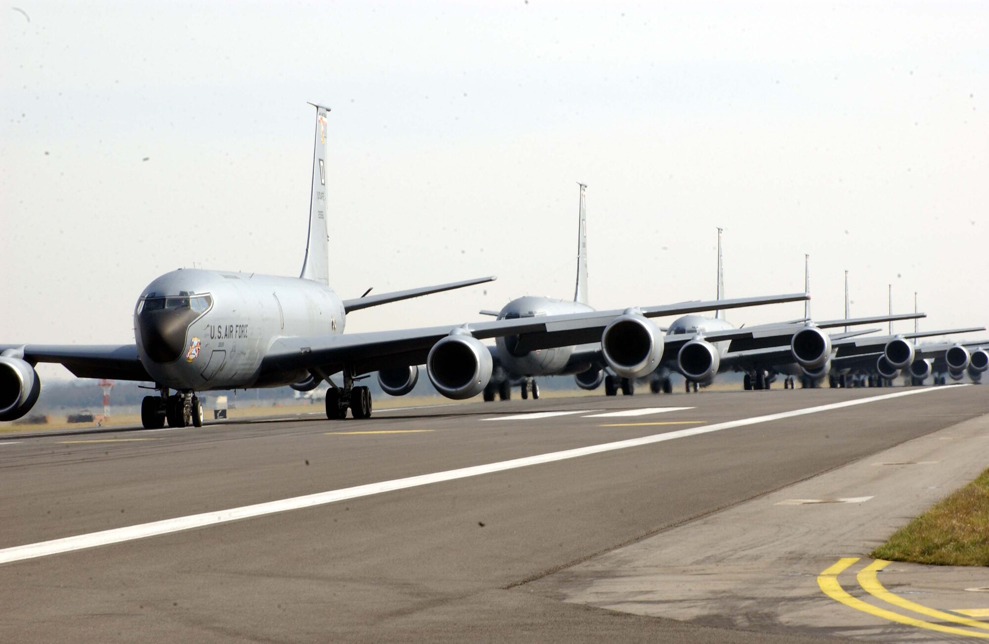 ROYAL AIR FORCE MILDENHALL, England – Six KC-135 Stratotankers move on the taxiway as part of a training mission to validate maintenance and operational capabilities.  According to regulations and safety reasons, the formation of six is the maximum number of aircraft allowed to take off together. The training mission demonstrated Team Mildenhall’s quick response capability as the only Air Force refueling wing in Europe. (Photo by Staff Sergeant Jeanette Copeland)