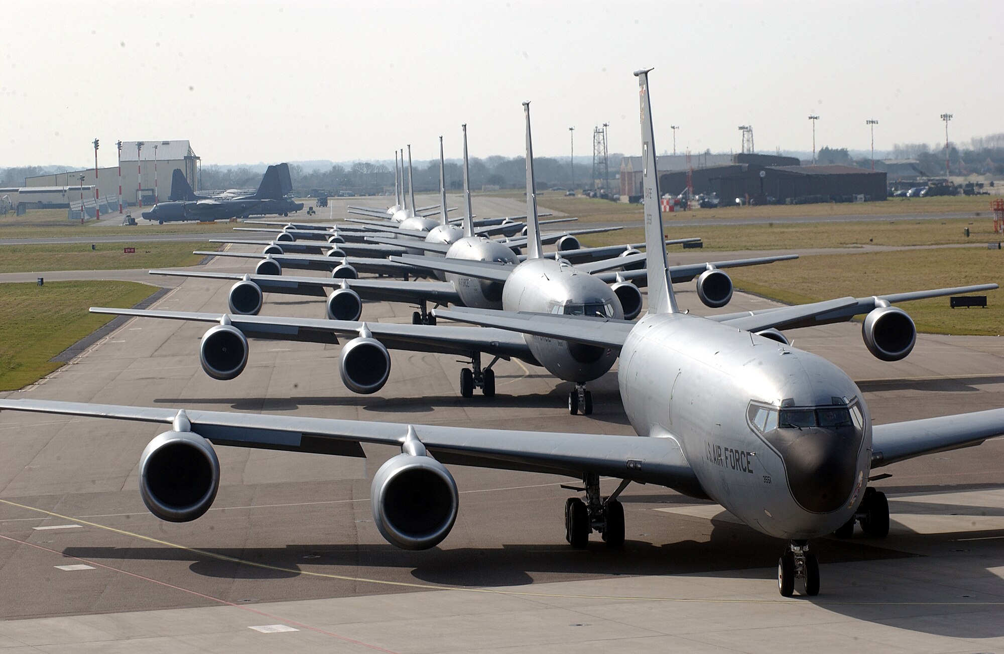 ROYAL AIR FORCE MILDENHALL, England – Six KC-135 Stratotankers move on the taxiway as part of a training mission to validate maintenance and operational capabilities.  According to regulations and safety reasons, the formation of six is the maximum number of aircraft allowed to take off together. The training mission demonstrated Team Mildenhall’s quick response capability as the only Air Force refueling wing in Europe. (Photo by Staff Sergeant Jeanette Copeland)