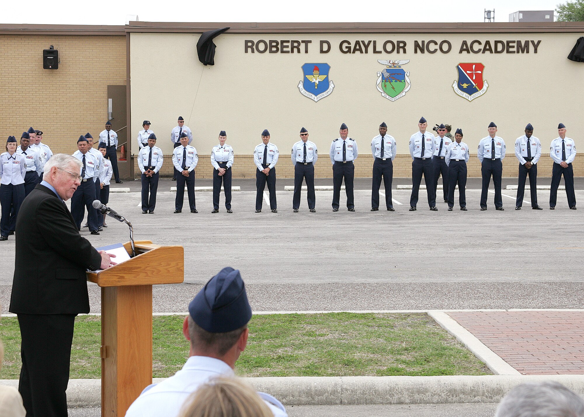 The fifth Chief Master Sergeant of the Air Force, Robert D. Gaylor, addresses a crowd at Lackland Air Force Base, Texas, on Thursday, March 30, 2006.  The Lackland noncommissioned officer academy was renamed the Robert D. Gaylor NCO Academy.  The academy has a 33-year history. It graduates more than 1,600 students a year, making it the largest NCO academy in the Air Force. (U.S. Air Force photo/Robbin Cresswell)