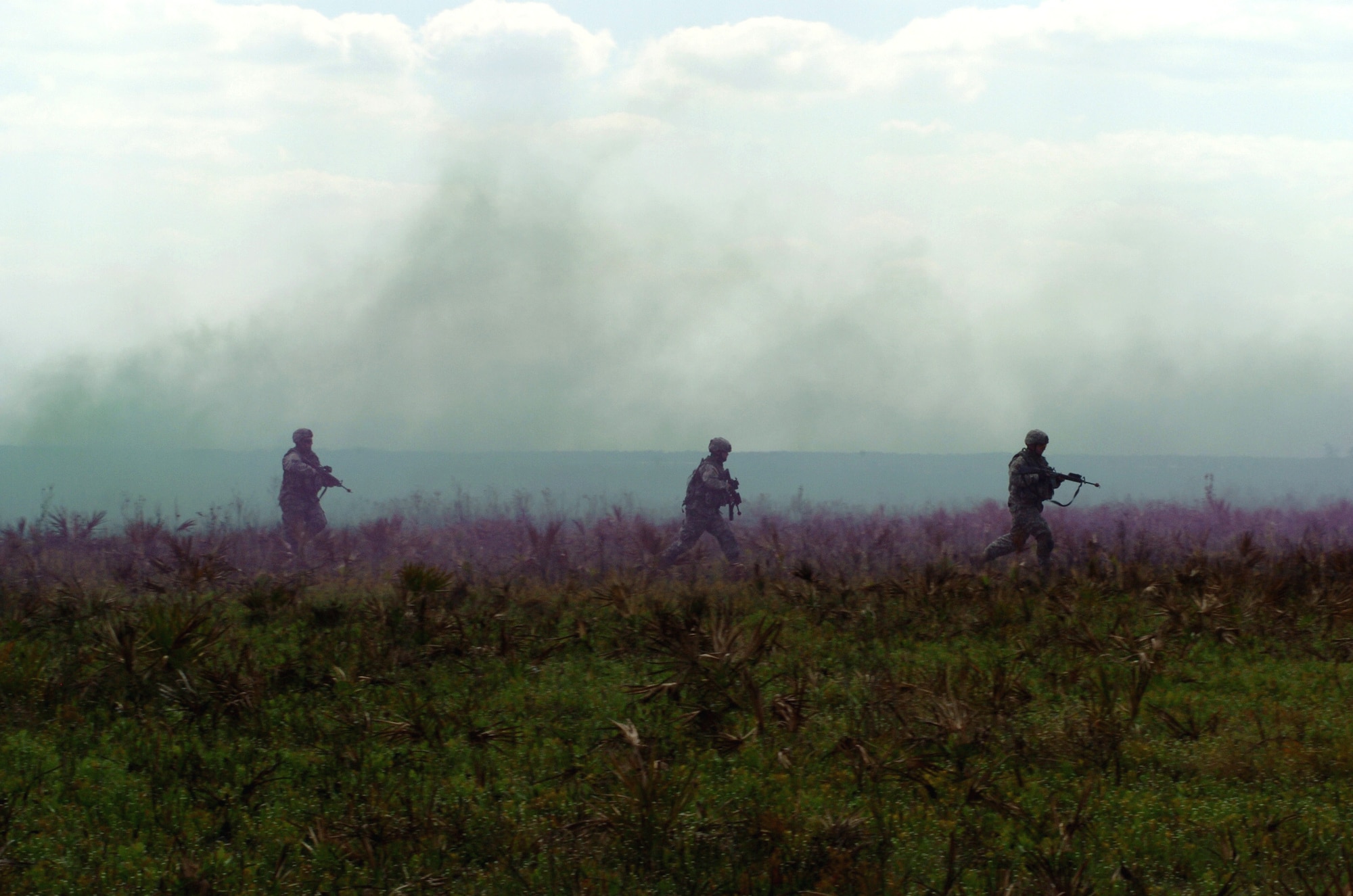 Members of a 42-person scout team advance on a mock village at Avon Park, Fla., March 29, 2006, as part of Atlantic Strike III, an arena for realistic urban warfare training.  (U.S. Air Force photo/Staff Sgt. Ashley S. Brokop)