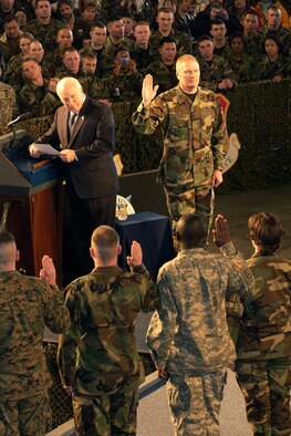 Vice President of the United States Richard Cheney, and 375th AW Commander, Col. Raymond Rottman, perform a mass re-enlistment during the Vice President's visit to Scott AFB.                               