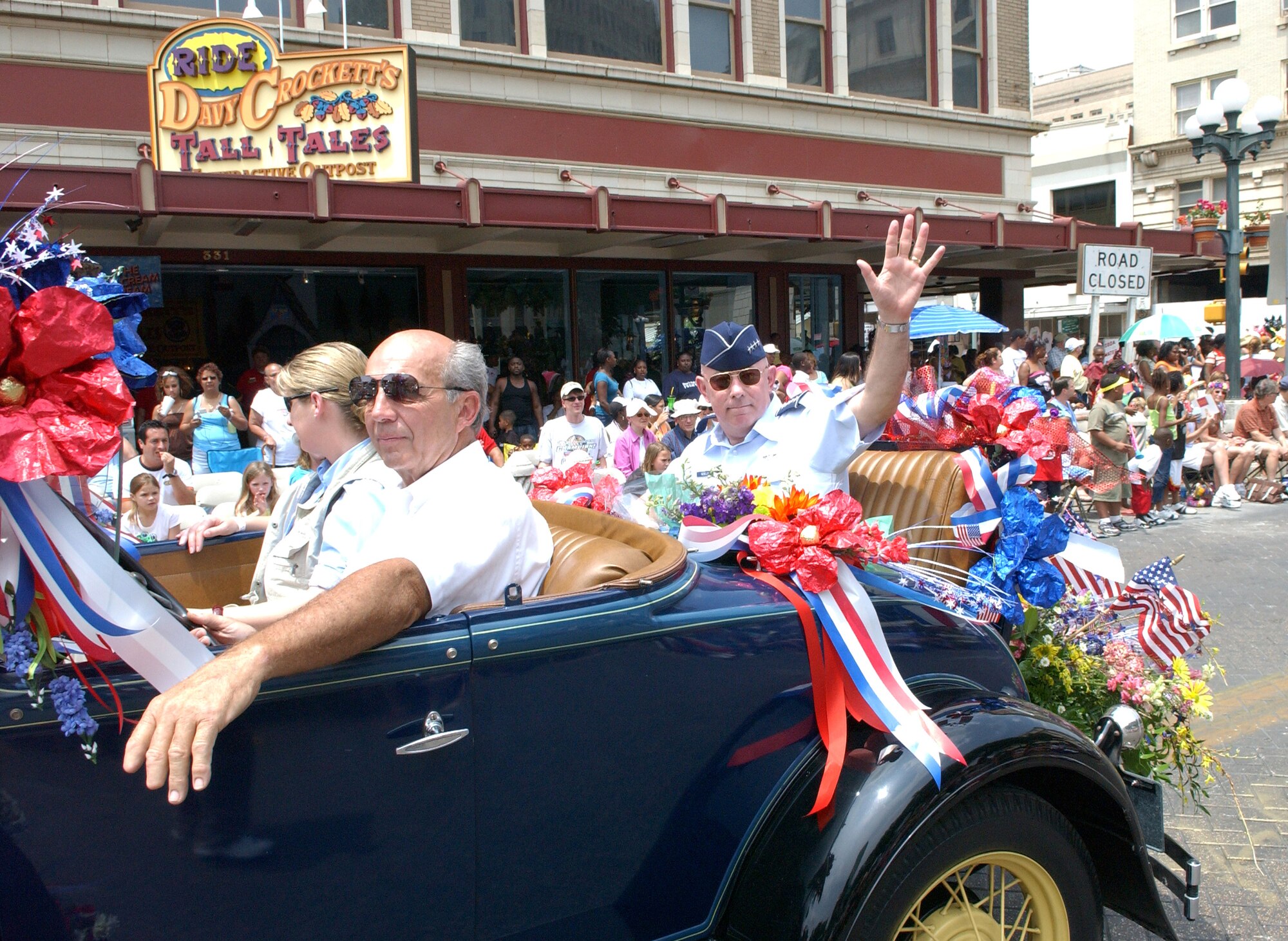 Gen. T. Michael Moseley, Air Force chief of staff, waves from the back of a Model A during the Fiesta Battle of Flowers parade on Friday, April 28, 2006.  General Moseley was the parade grand marshall.  This parade is one of several events during Fiesta, a 10-day celebration to honor the memory of the heroes of the Alamo and the Battle of San Jacinto in 1836.   (U.S. Air Force photo/Alan Boedecker)