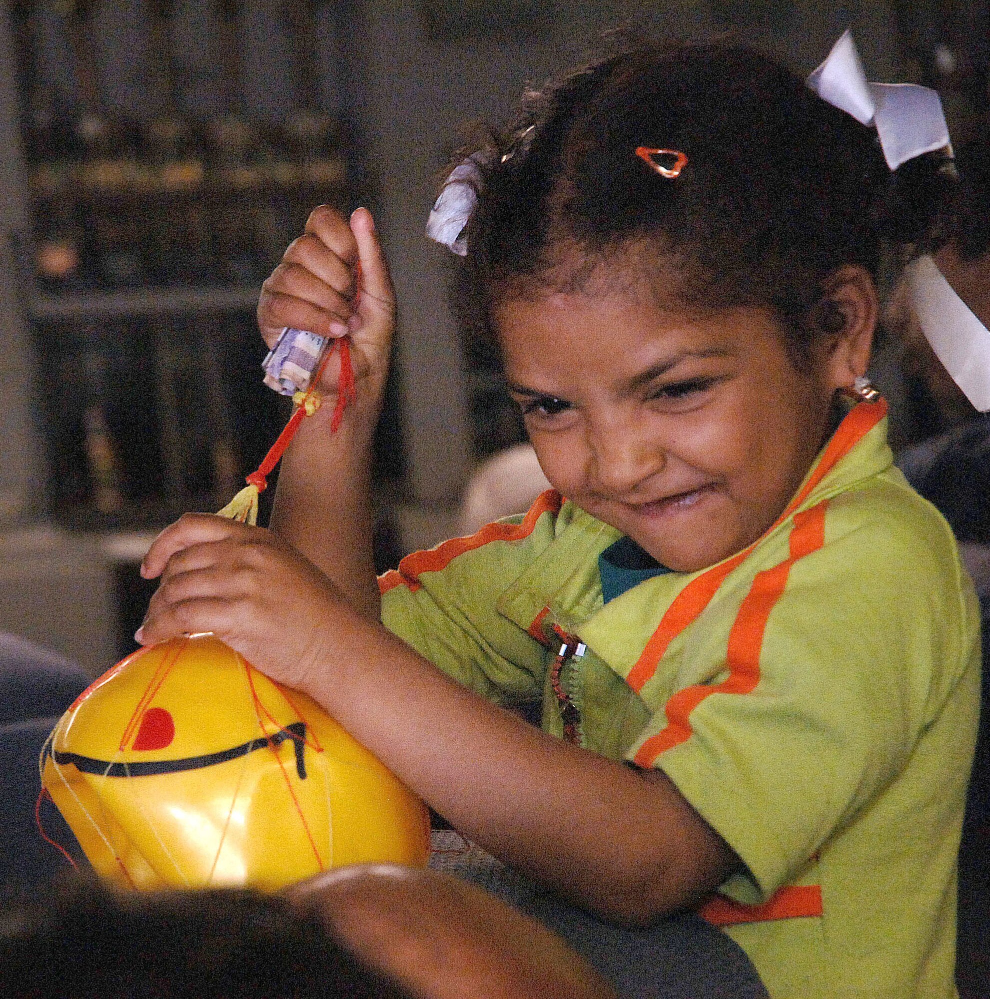 An Iraqi girl plays aboard an Air Force C-17 Globemaster III at Baghdad International Airport, Iraq, on Saturday, April 29, 2006. She was one of more than 100 Iraqi children who received surgery in Amman, Jordan, thanks to Operation Smile, an organization that provides corrective surgery for cleft palates and cleft lips. The children were flown back to Iraq on the C-17. (U.S. Air Force photo/Master Sgt. Will Ackerman)